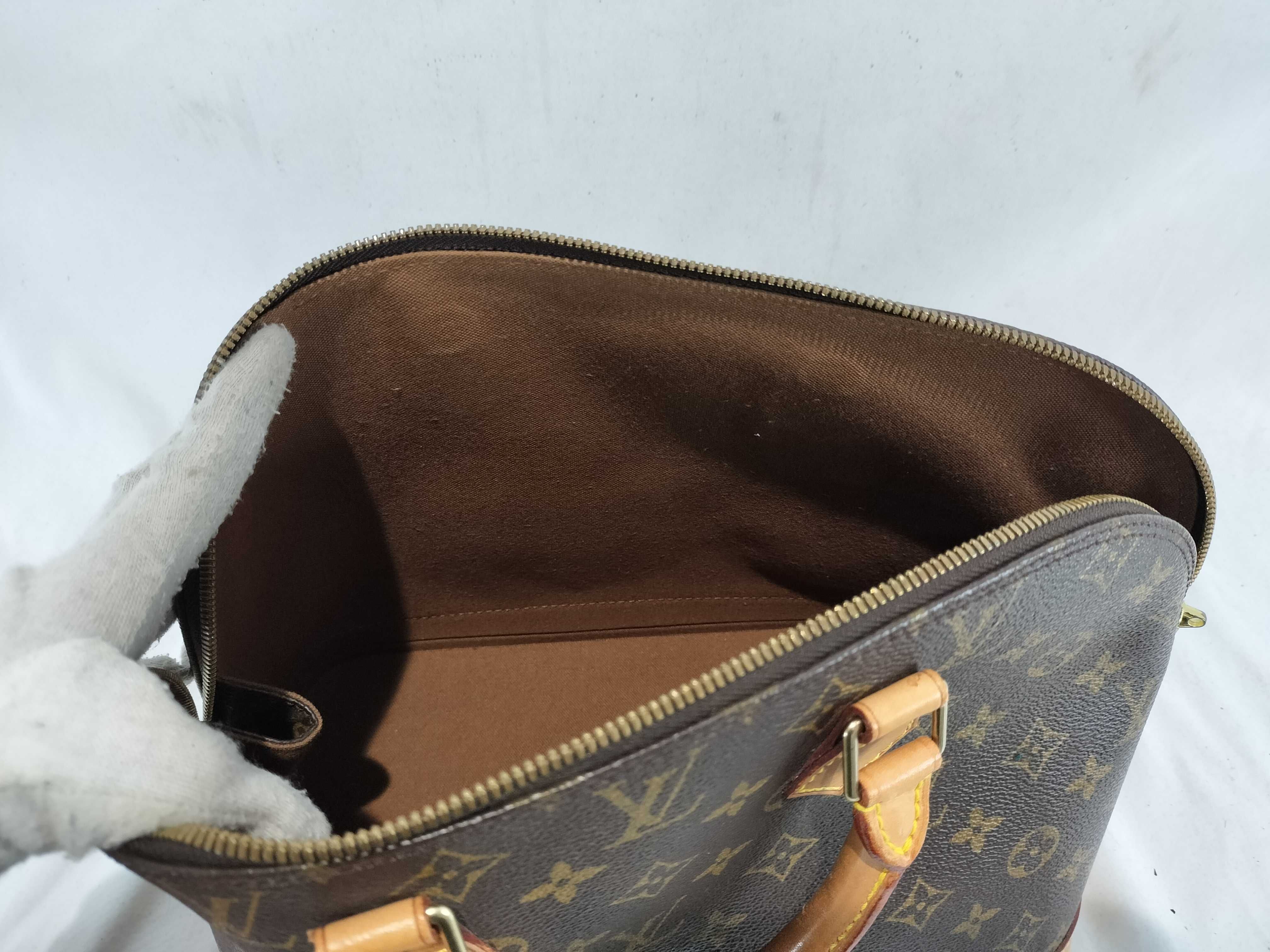 Monogram Alma 30 Handbag — view 9