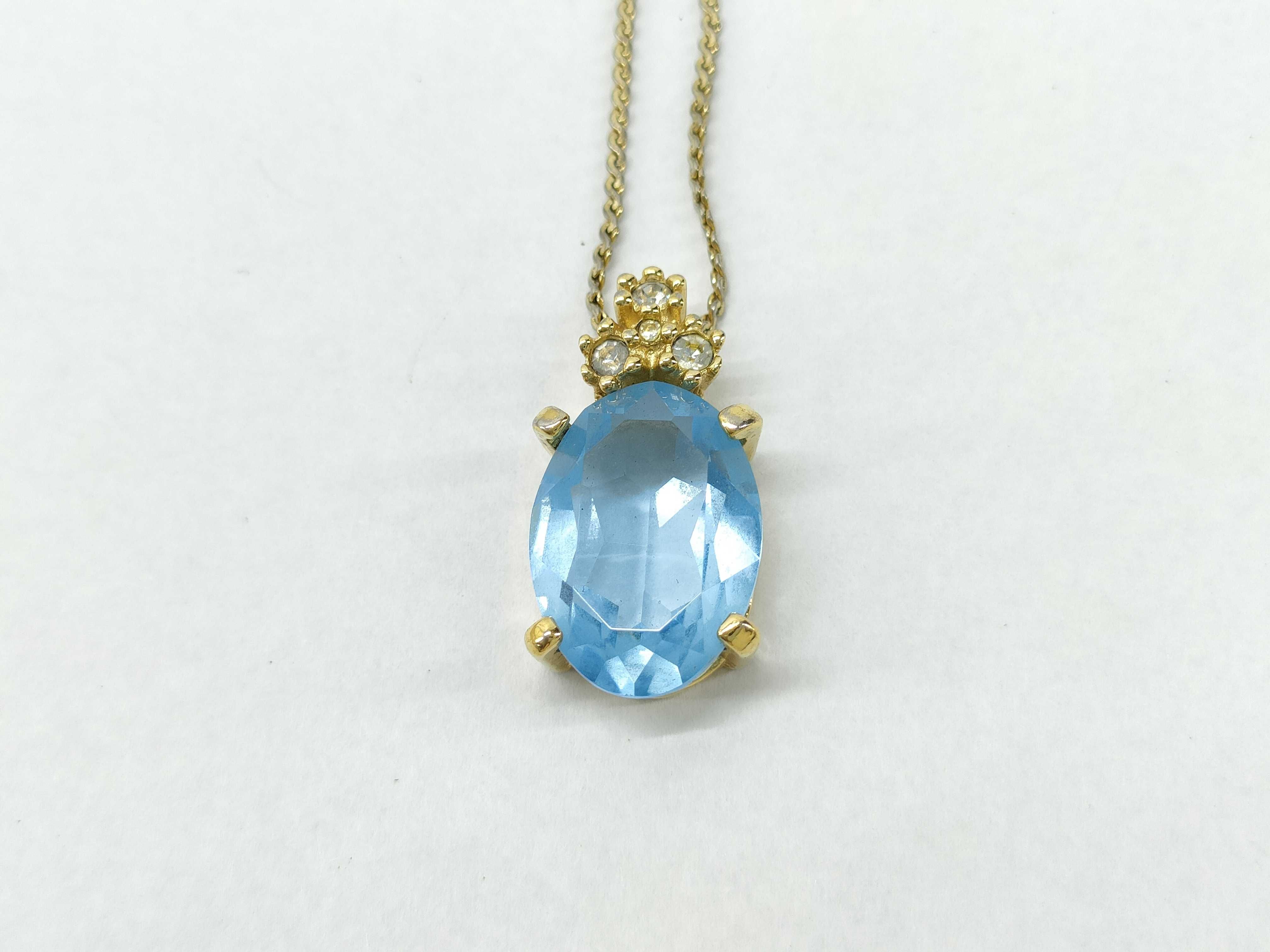 gold necklace with gemstones