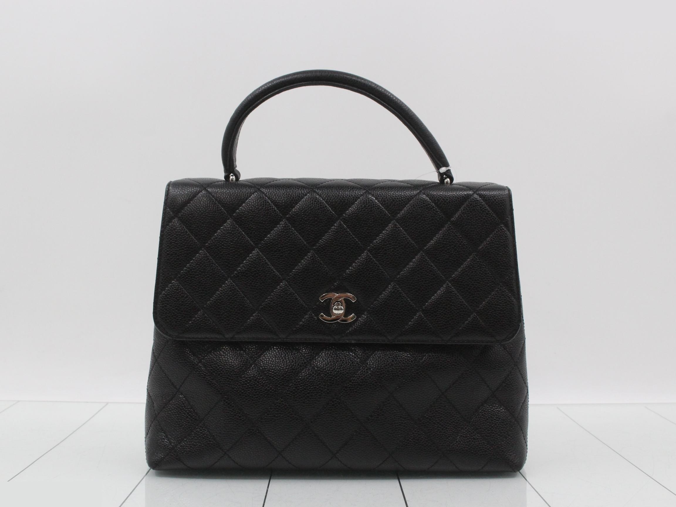 Kelly-style caviar leather handbag, black, with original seal.