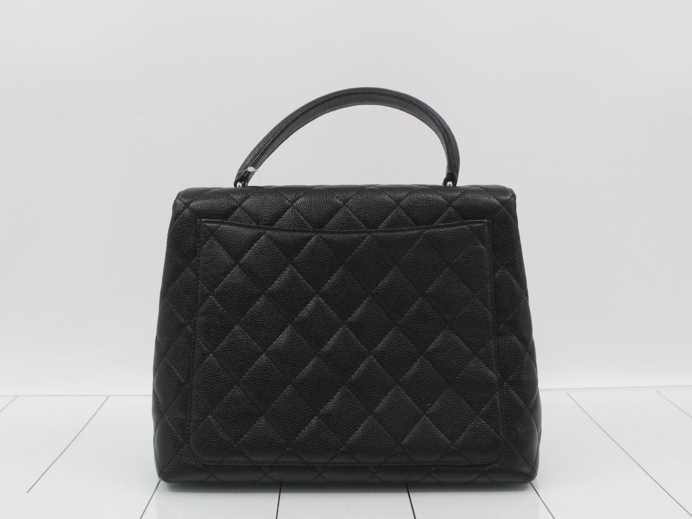 Kelly-style caviar leather handbag, black, with original seal. — view 2