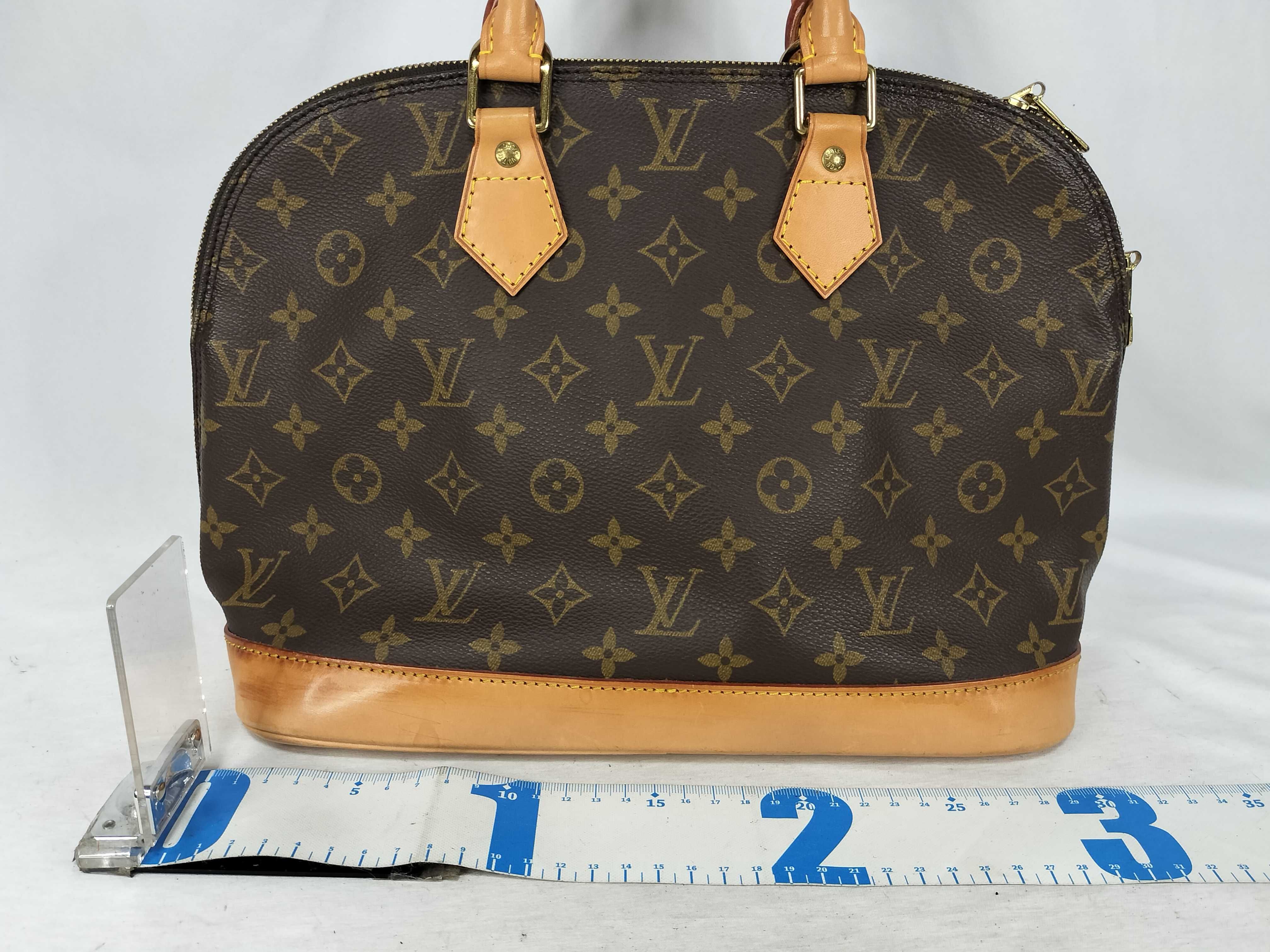 Monogram LV Alma Monogram Handbag — view 2