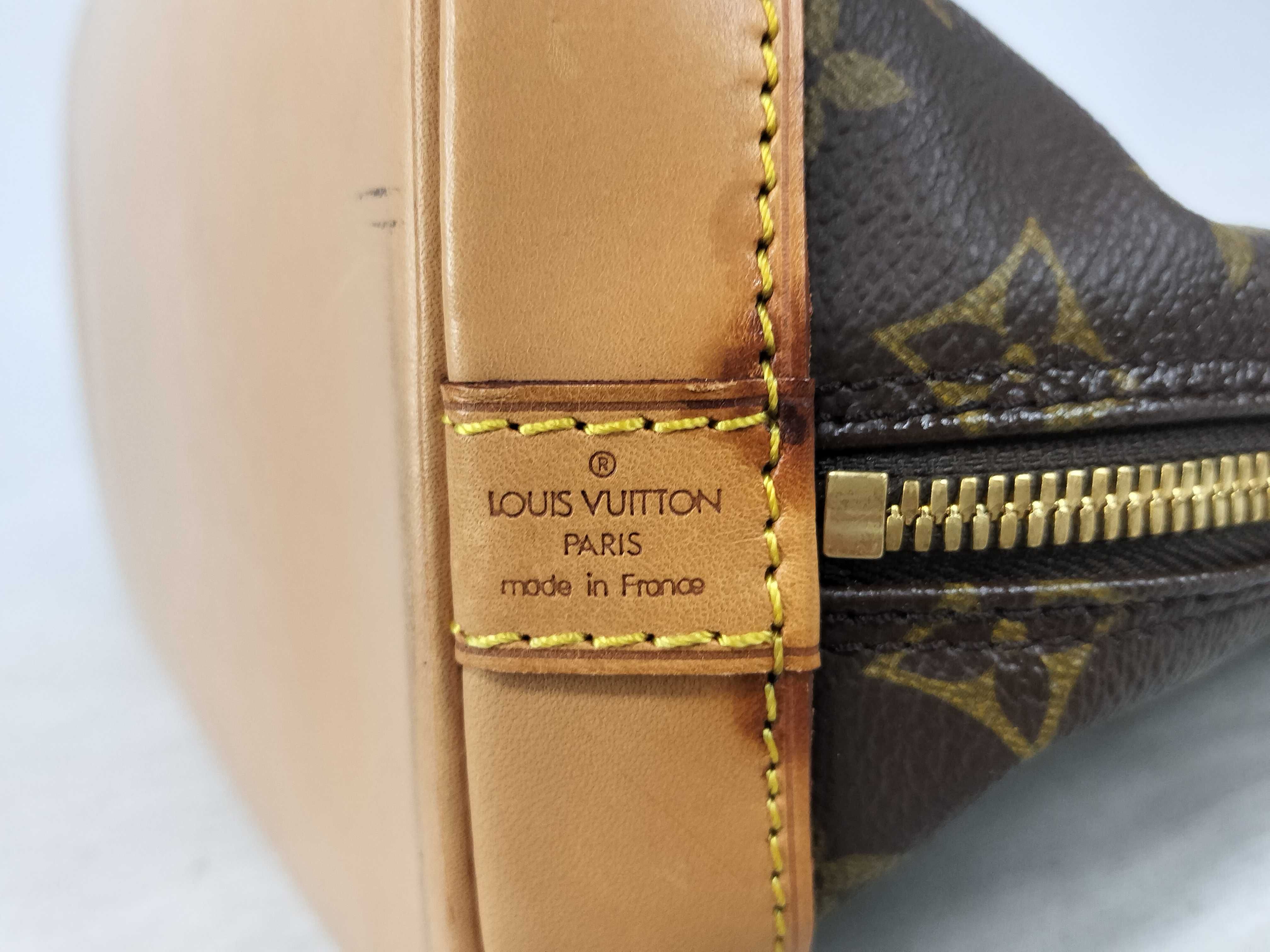 Monogram LV Alma Monogram Handbag — view 12