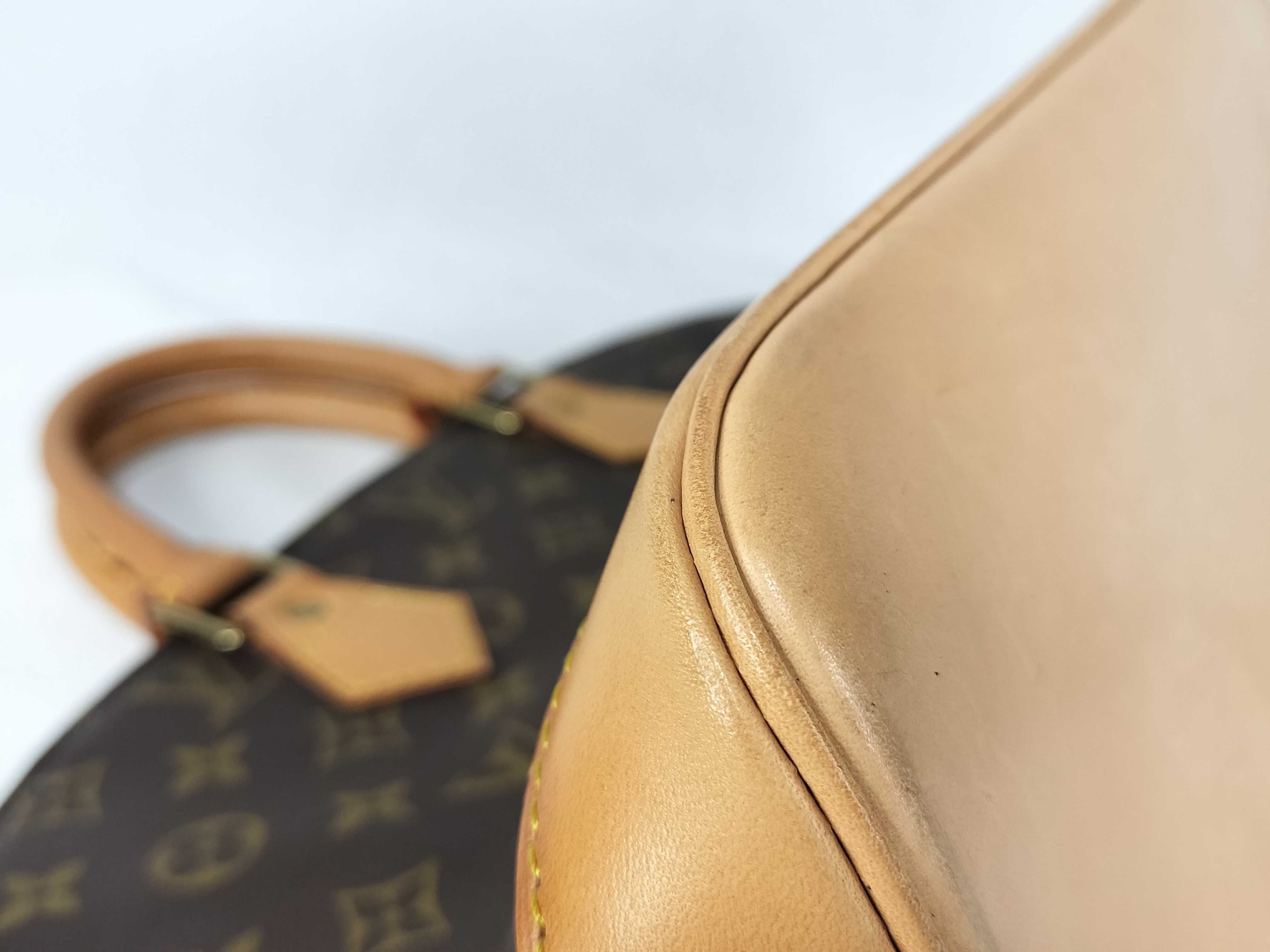 Monogram LV Alma Monogram Handbag — view 7