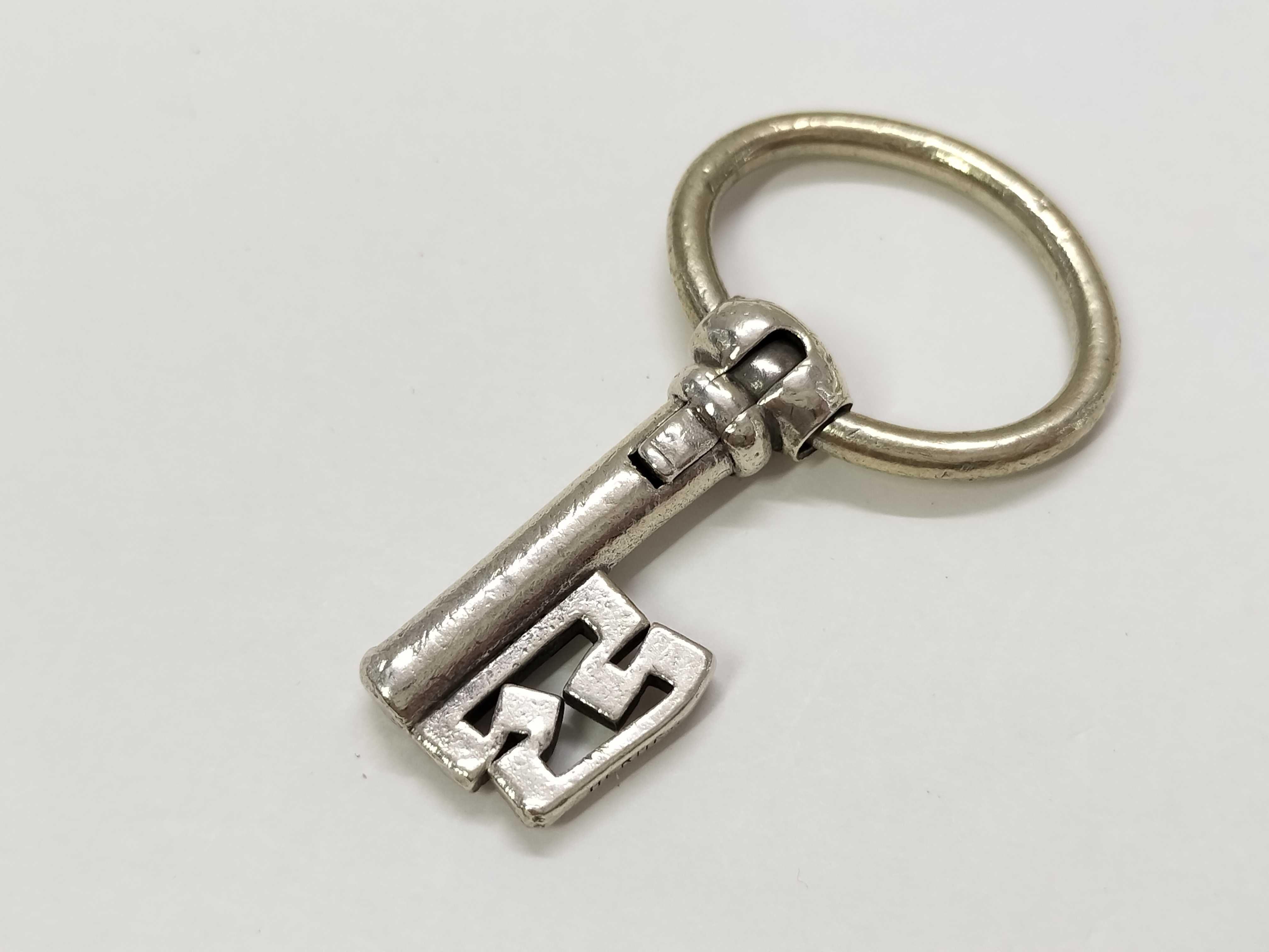 Key-shaped charm key ring silver charm — view 2