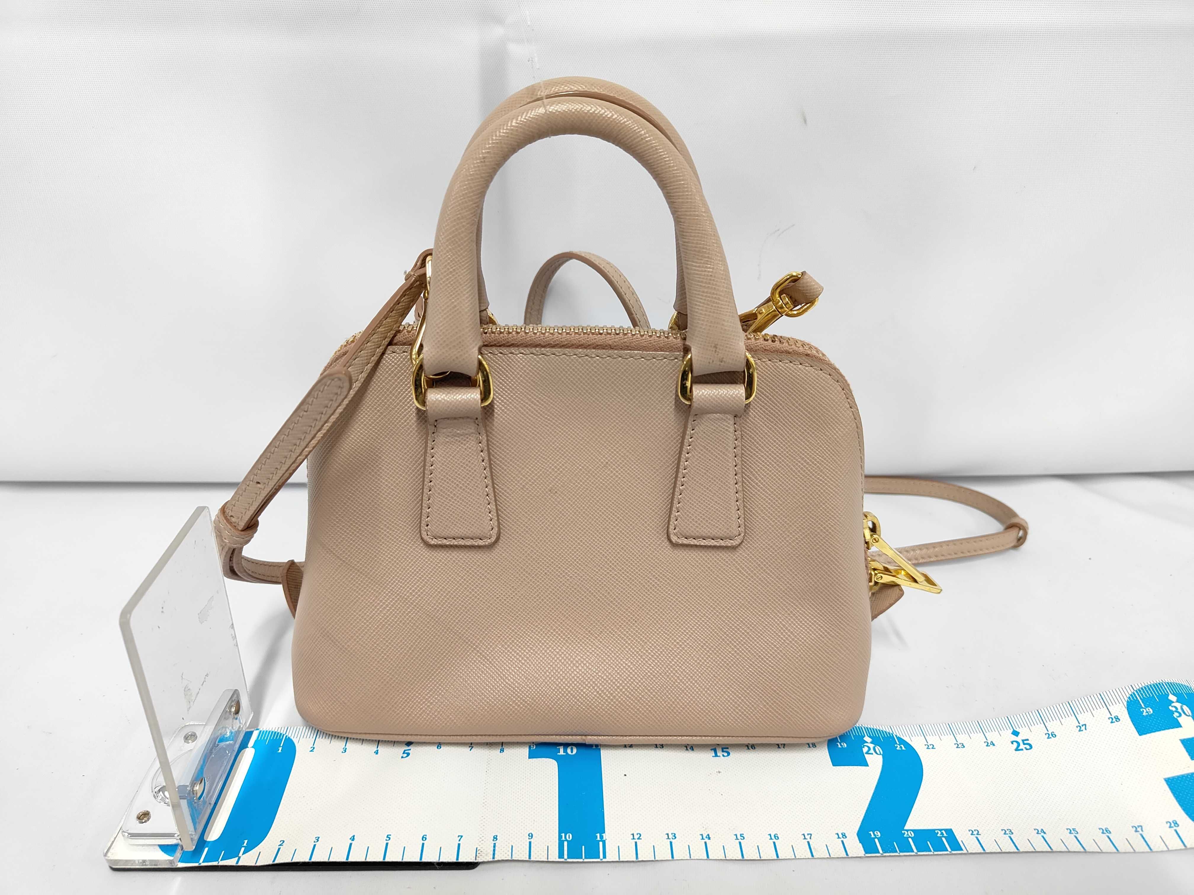 Saffiano Triangle Logo Promenade Leather 2-Way Mini Handbag — view 2