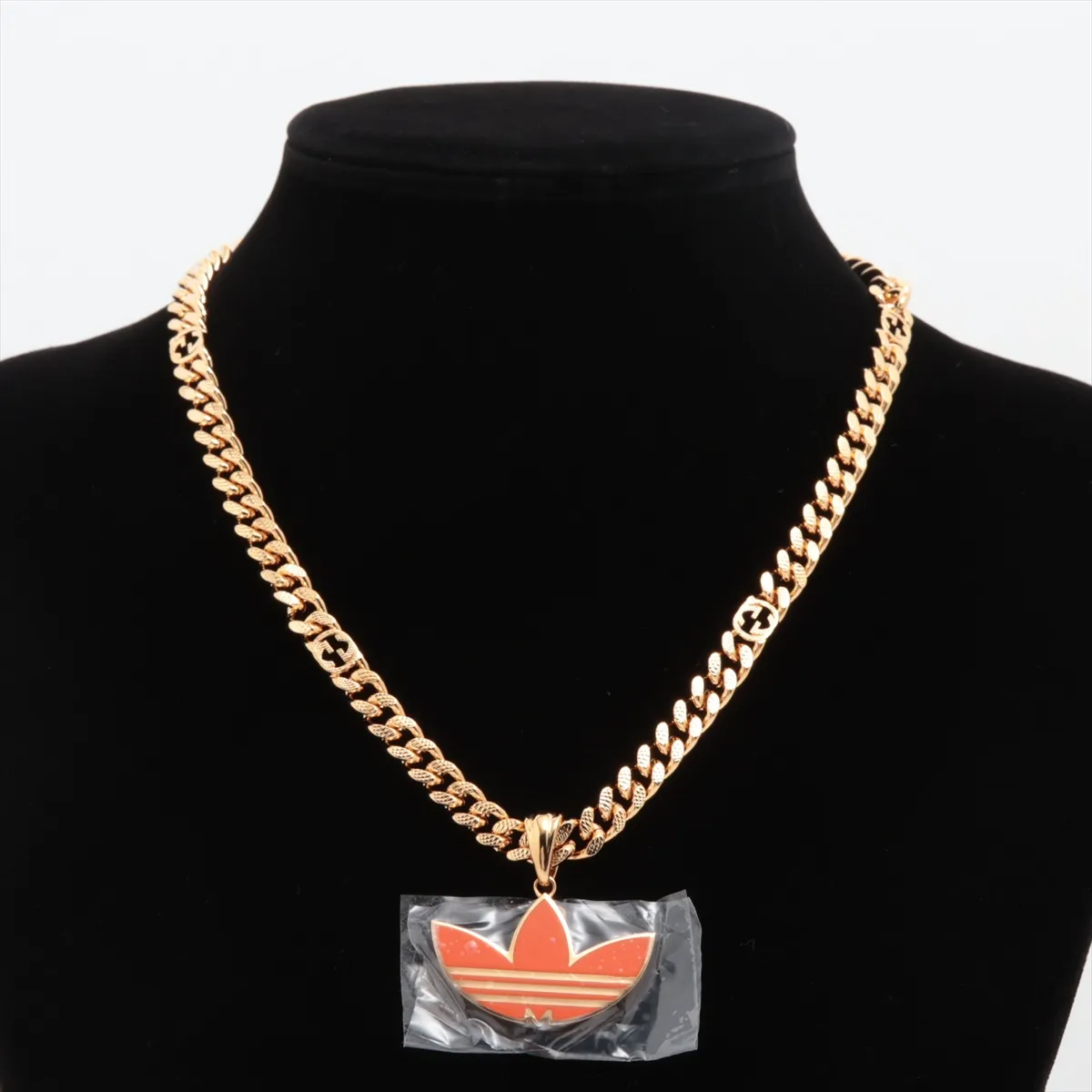 x Adidas Trefoil Gold Chain Necklace, GP Orange x Gold, with some wear, tarnishing, and stains. — view 5