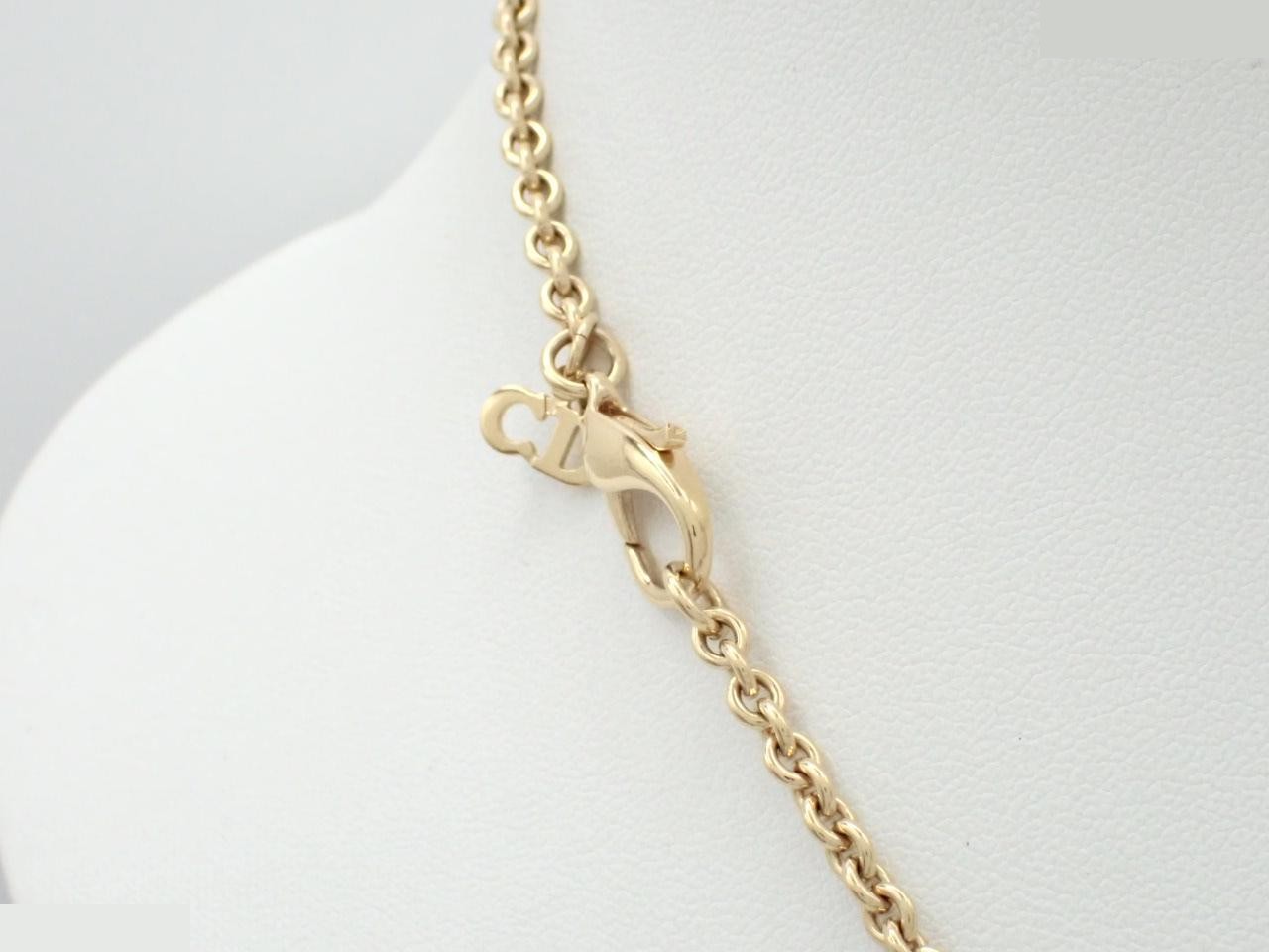Gold necklace with stone, chain approximately 50cm long. — view 2