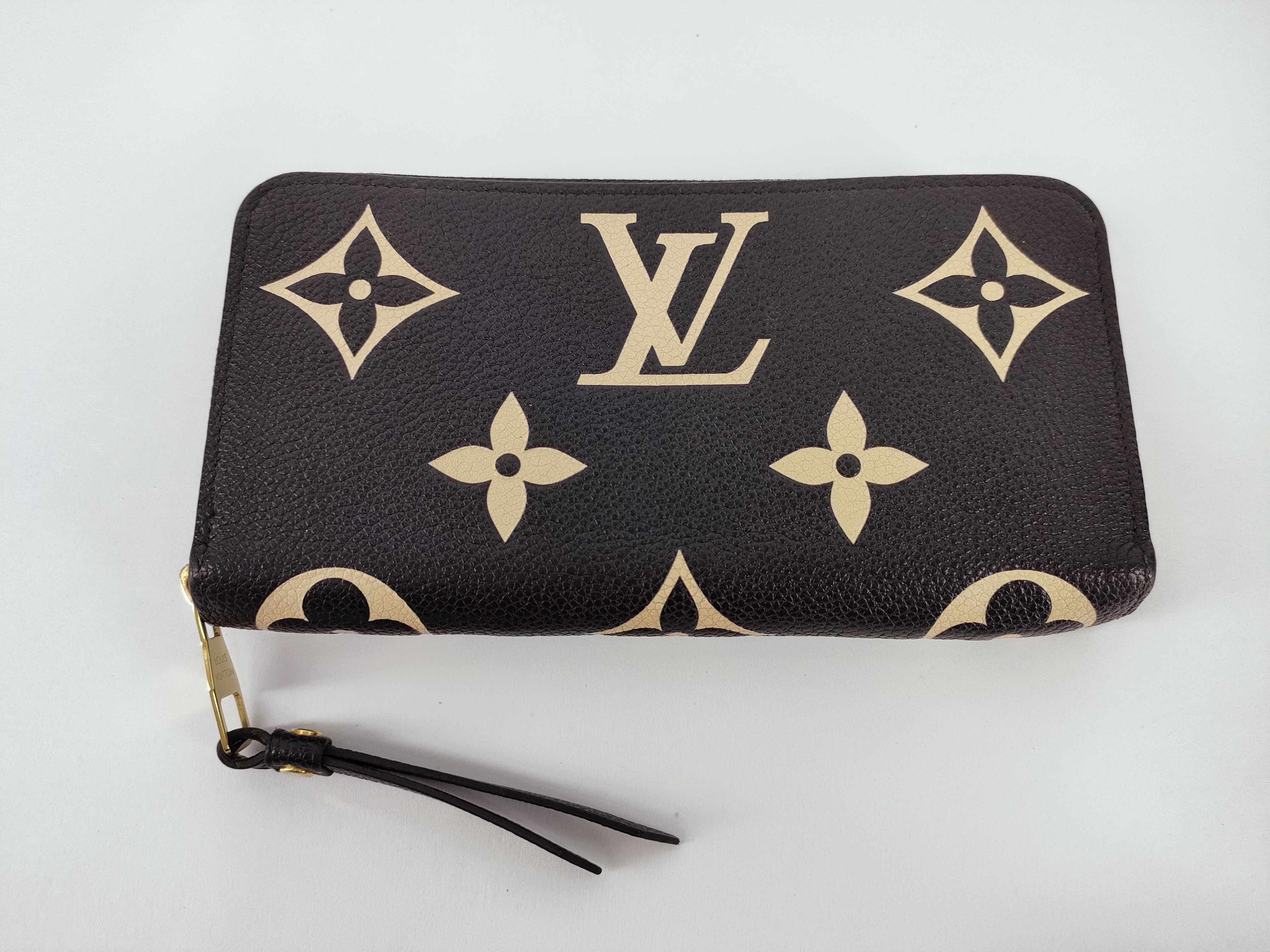 Bicolor Monogram Empreinte Zippy Wallet M80481