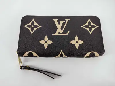 Bicolor Monogram Empreinte Zippy Wallet M80481