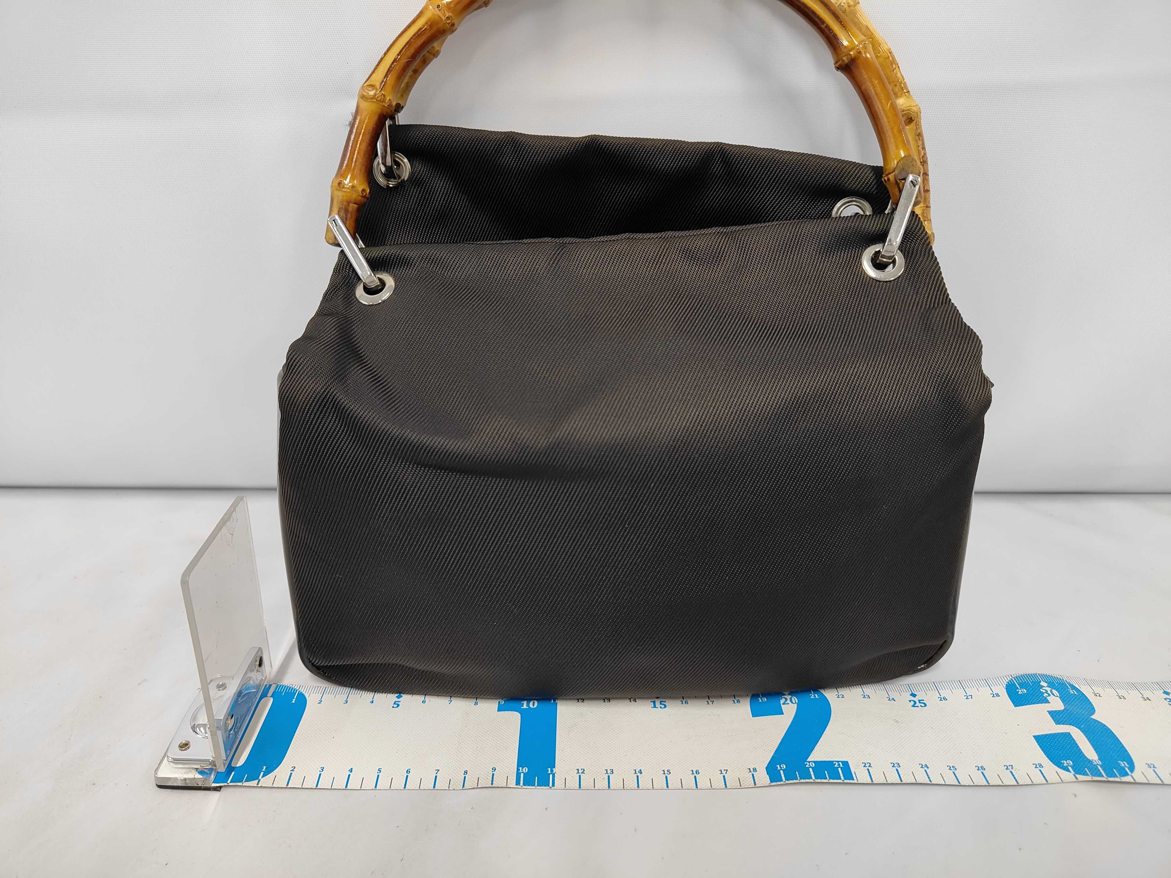 bag with brown bamboo handles. — view 2