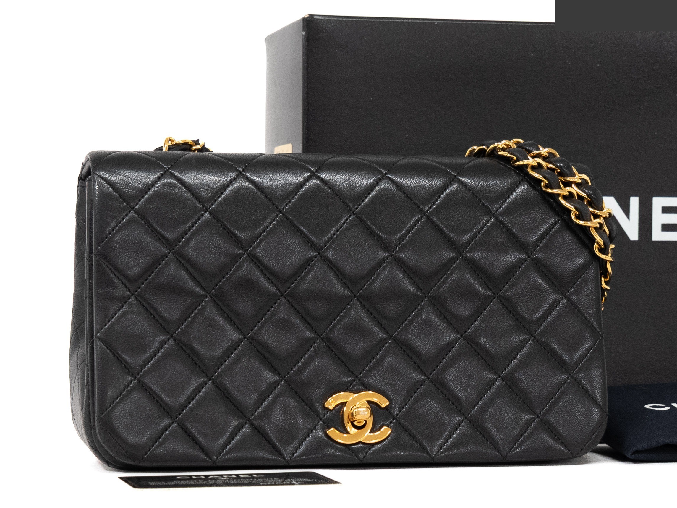 Matelassé full flap bag, matching seal card, box and bag included.