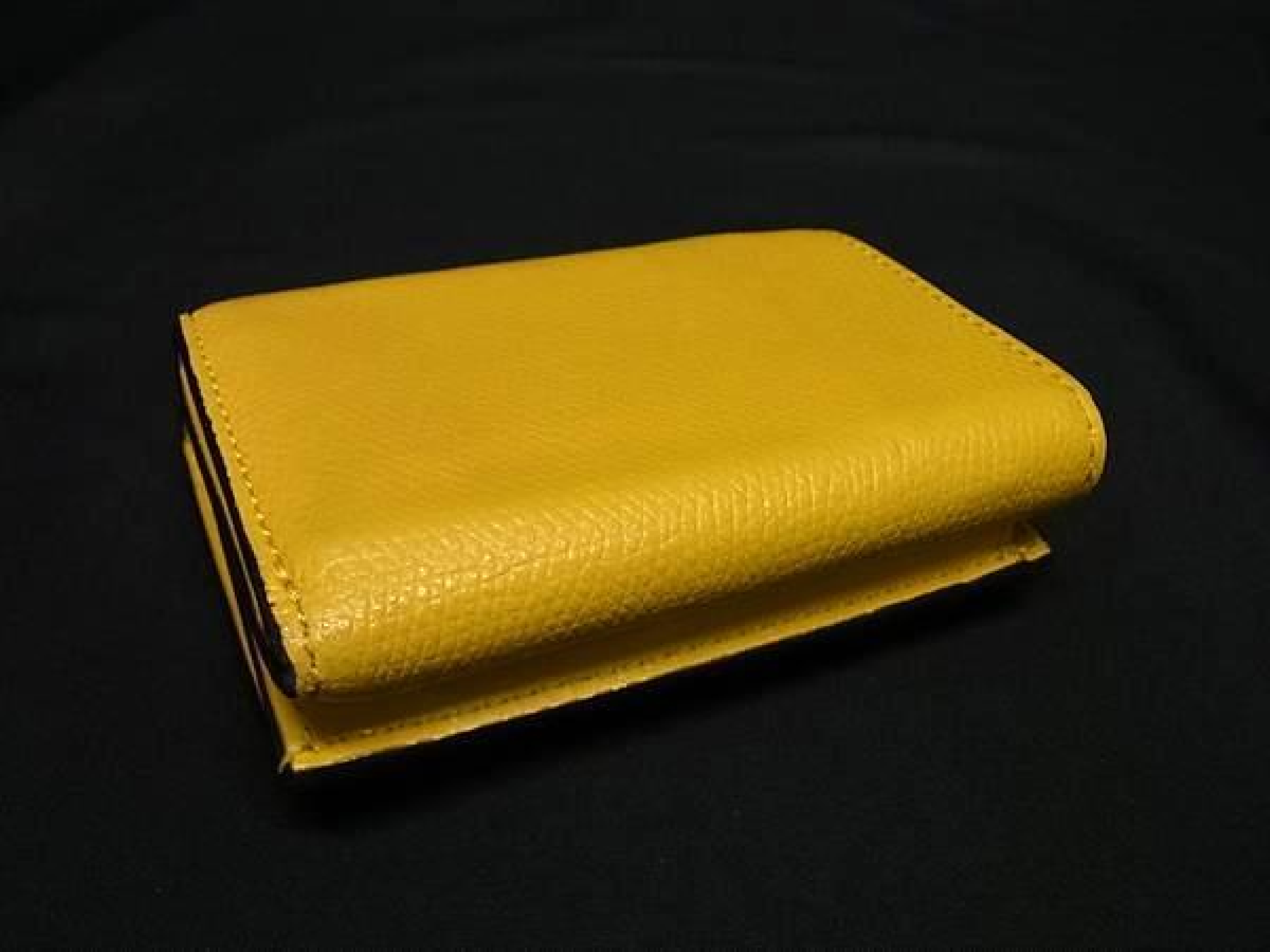 Zucca pattern F is leather trifold wallet with coin purse, bill compartment, and card slots, yellow and brown tones, HD0312. — view 2
