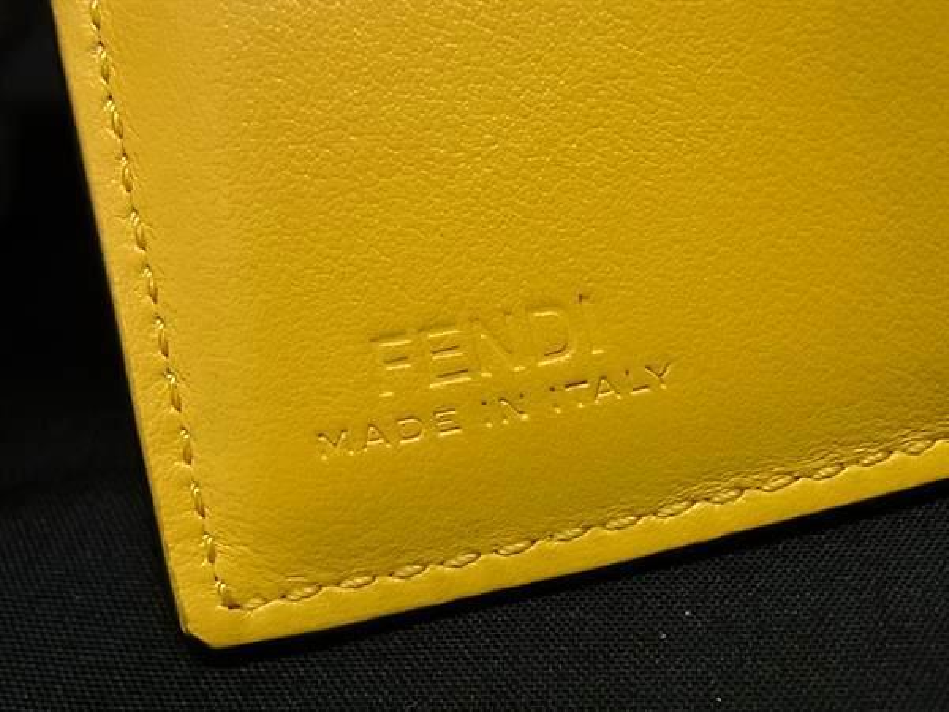 Zucca pattern F is leather trifold wallet with coin purse, bill compartment, and card slots, yellow and brown tones, HD0312. — view 7