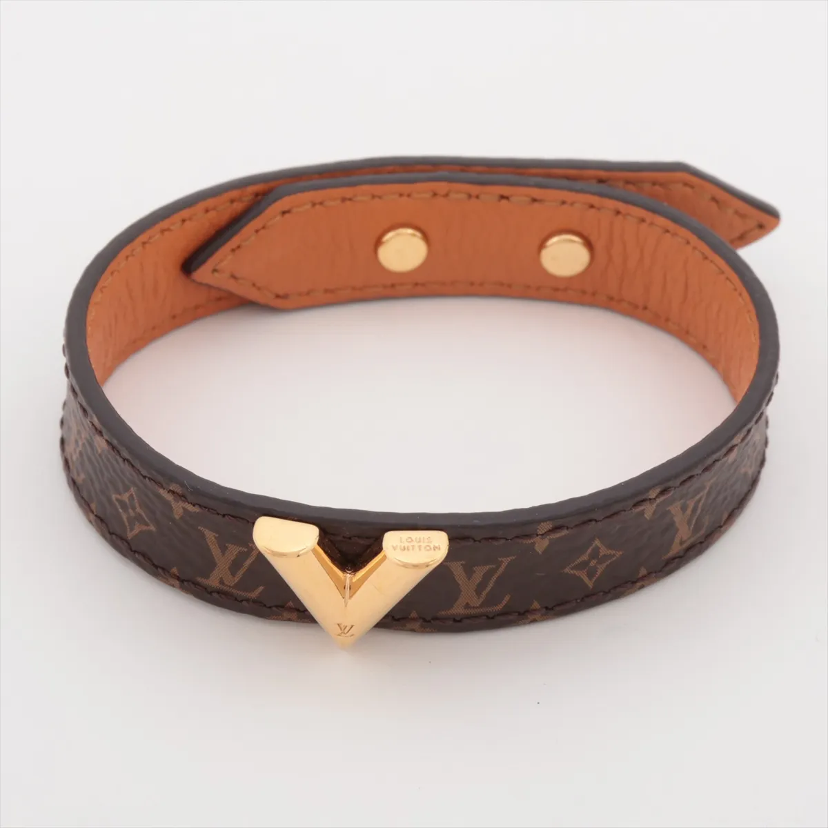 M6042 Bracelet Essential V BC2213 Bracelet, size 17, PVC, brown. Shows signs of wear including