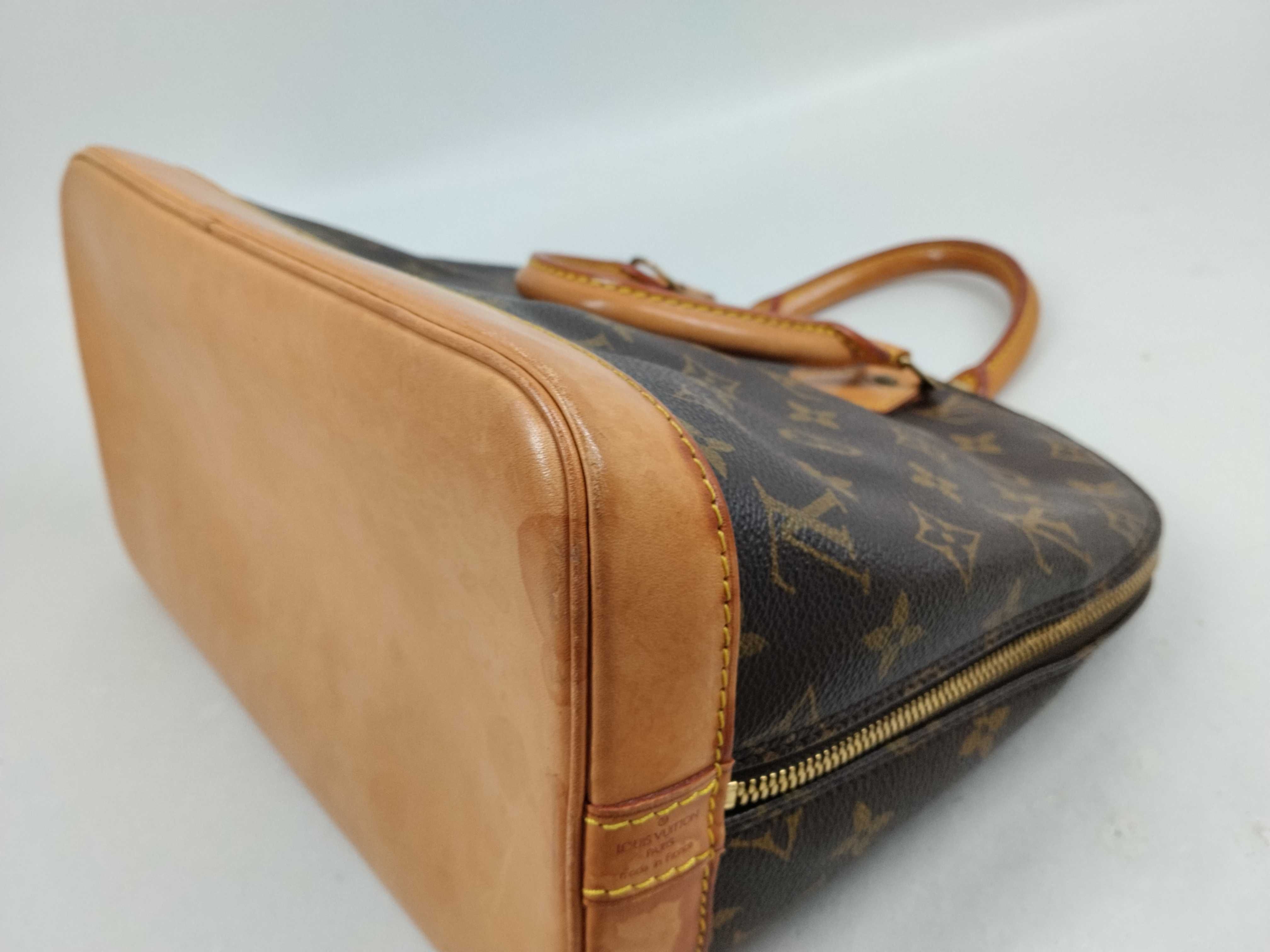 Monogram M40878 Alma MM Handbag — view 10
