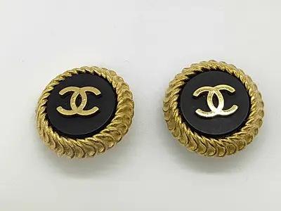 earrings, round shape, gold and black, with original box.