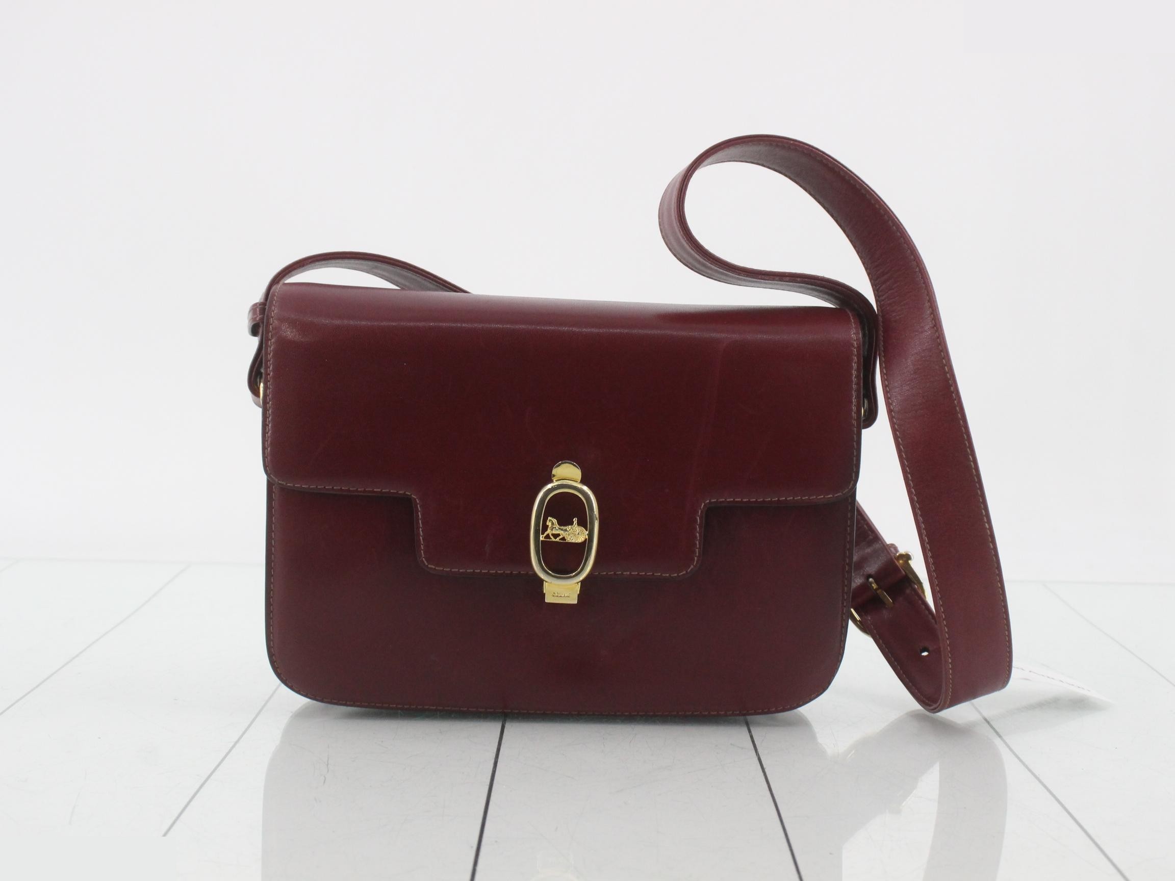 Old Celine shoulder bag, carriage design, gold hardware, rare model.