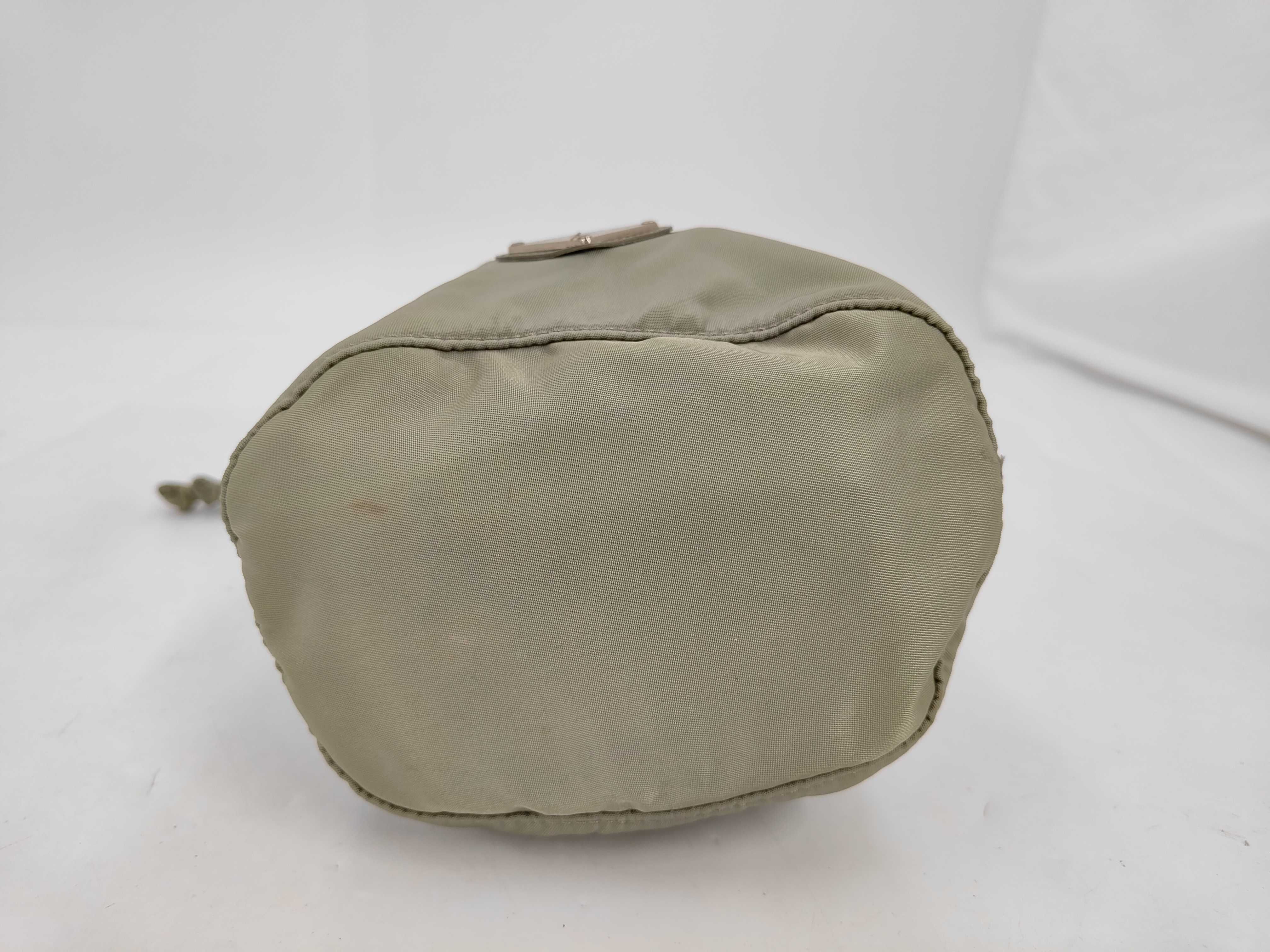 nylon drawstring pouch with triangular logo. (Nylon handbag/pouch) — view 4