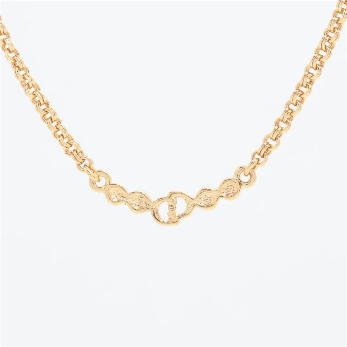 CD logo necklace, gold plated with rhinestones. Shows signs of wear, — view 2