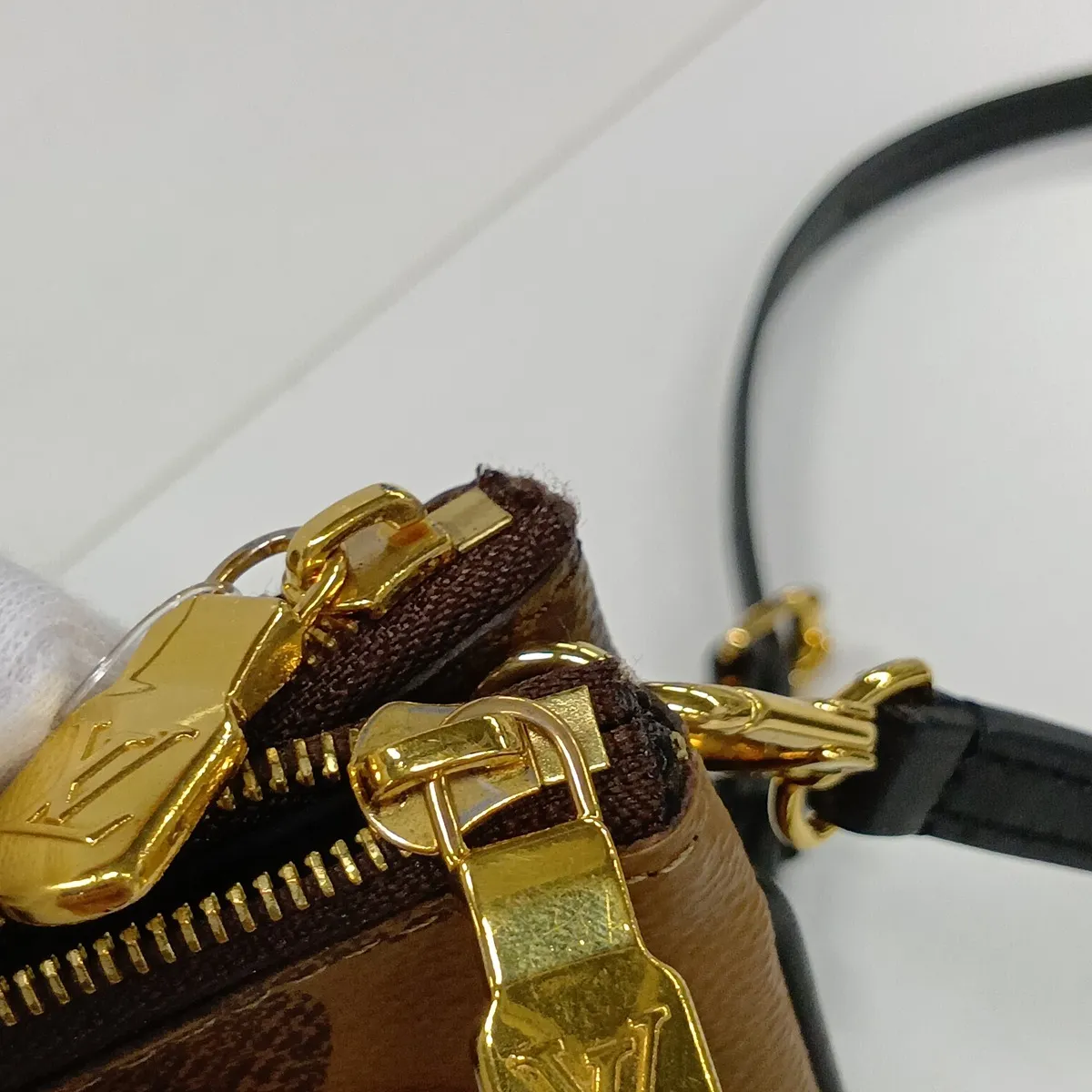 Giant Monogram Reverse Pochette Double Zip M69203 GI0260 Brown (RFID detected) — view 11