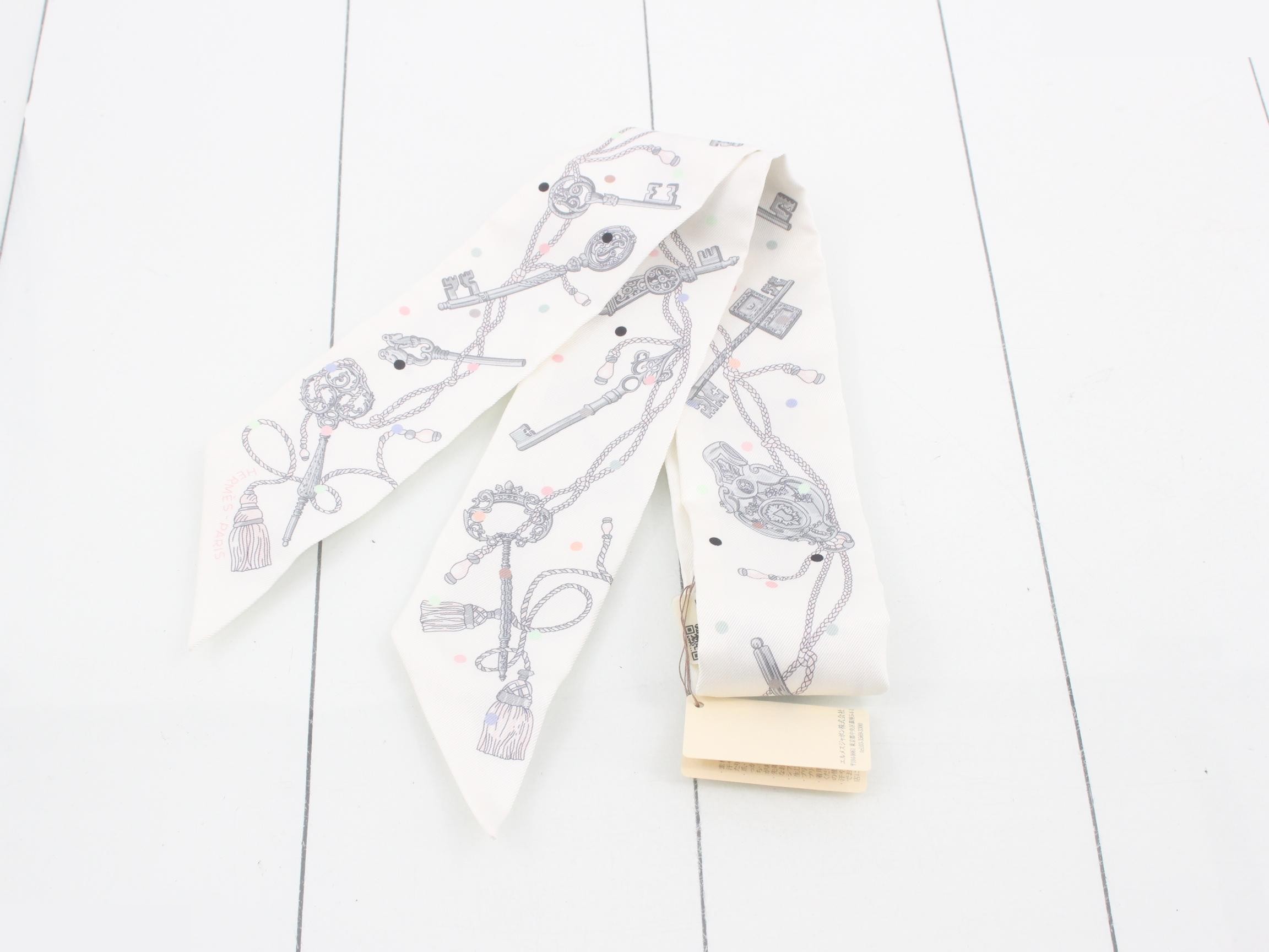 Twilly scarf, key and dot design, unused, with tags and box. — view 2