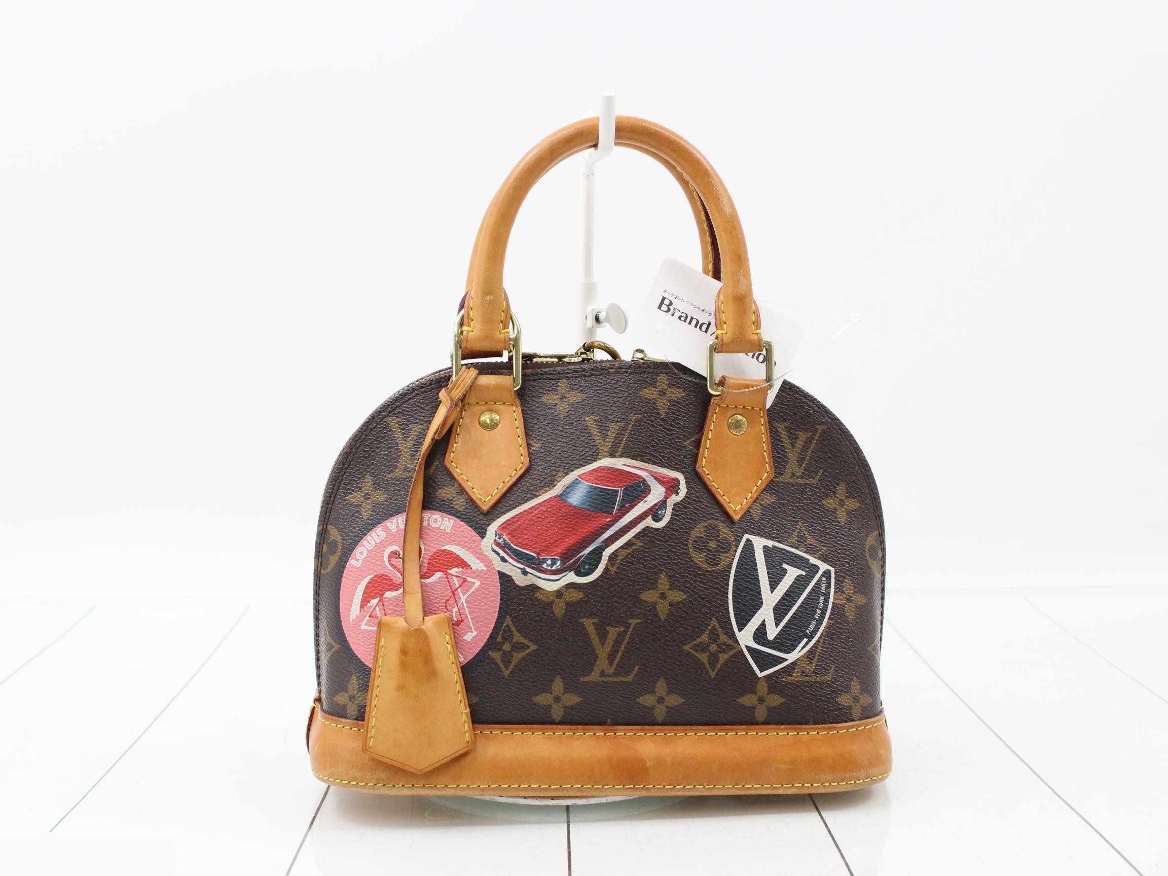 Monogram World Tour Alma 2-Way Shoulder/Handbag — view 2