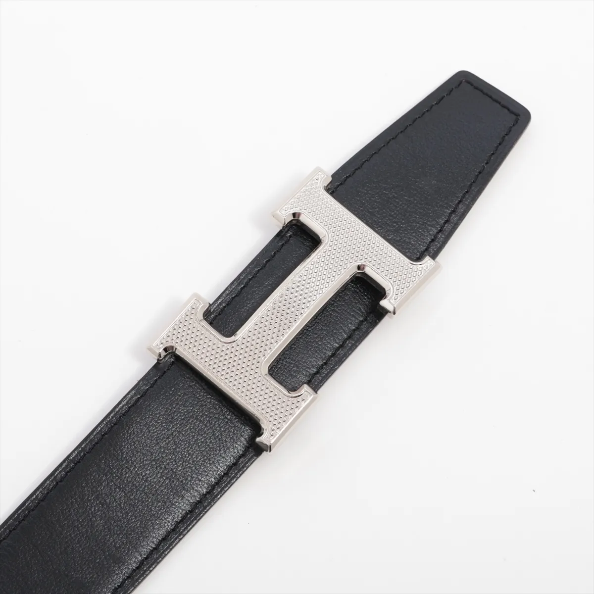 H Guilloché W stamp: 2024 belt, 100 leather, black x brown. Buckle dents, — view 2