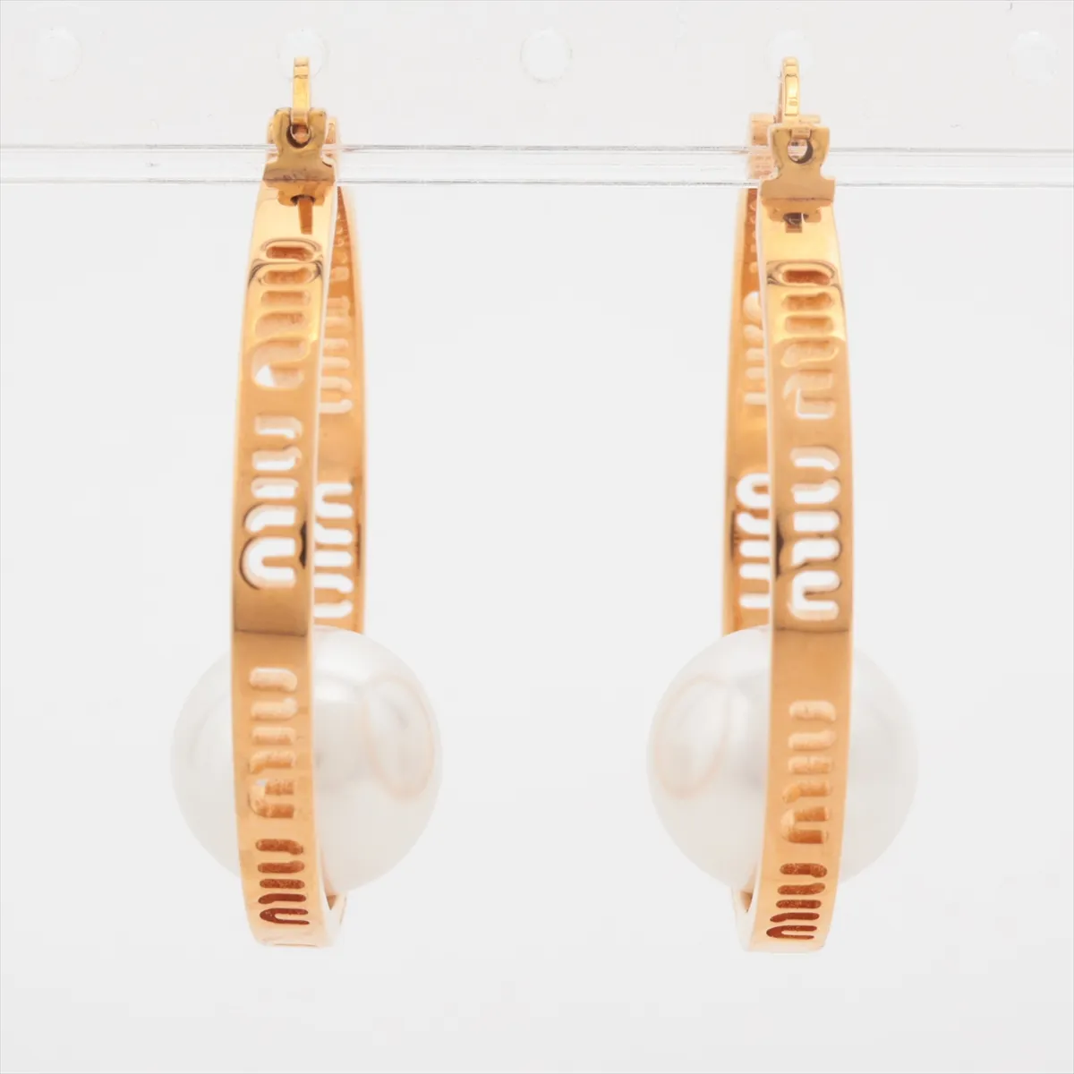 earrings (for both ears), gold-plated with faux pearls. Shows wear, tarnishing, and stains. — view 3