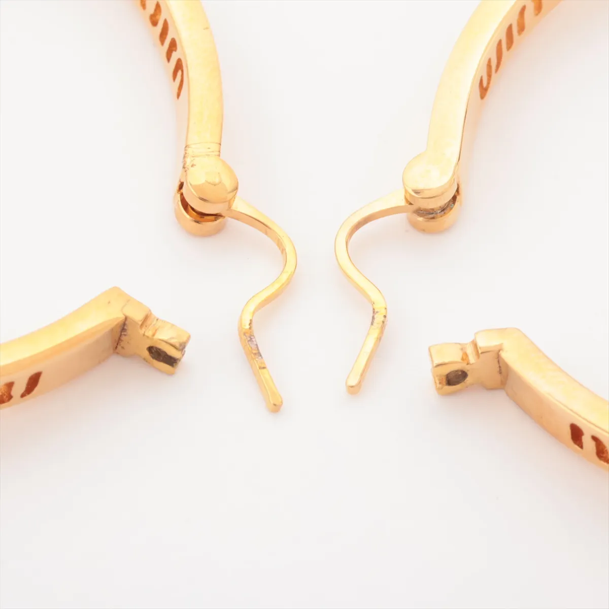 earrings (for both ears), gold-plated with faux pearls. Shows wear, tarnishing, and stains. — view 4