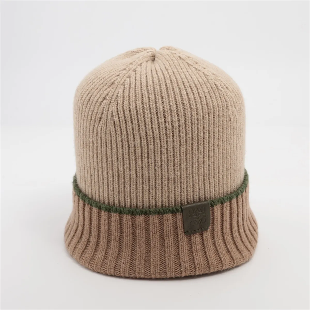 Anagram knit cap, wool, beige, some wear and pilling.
