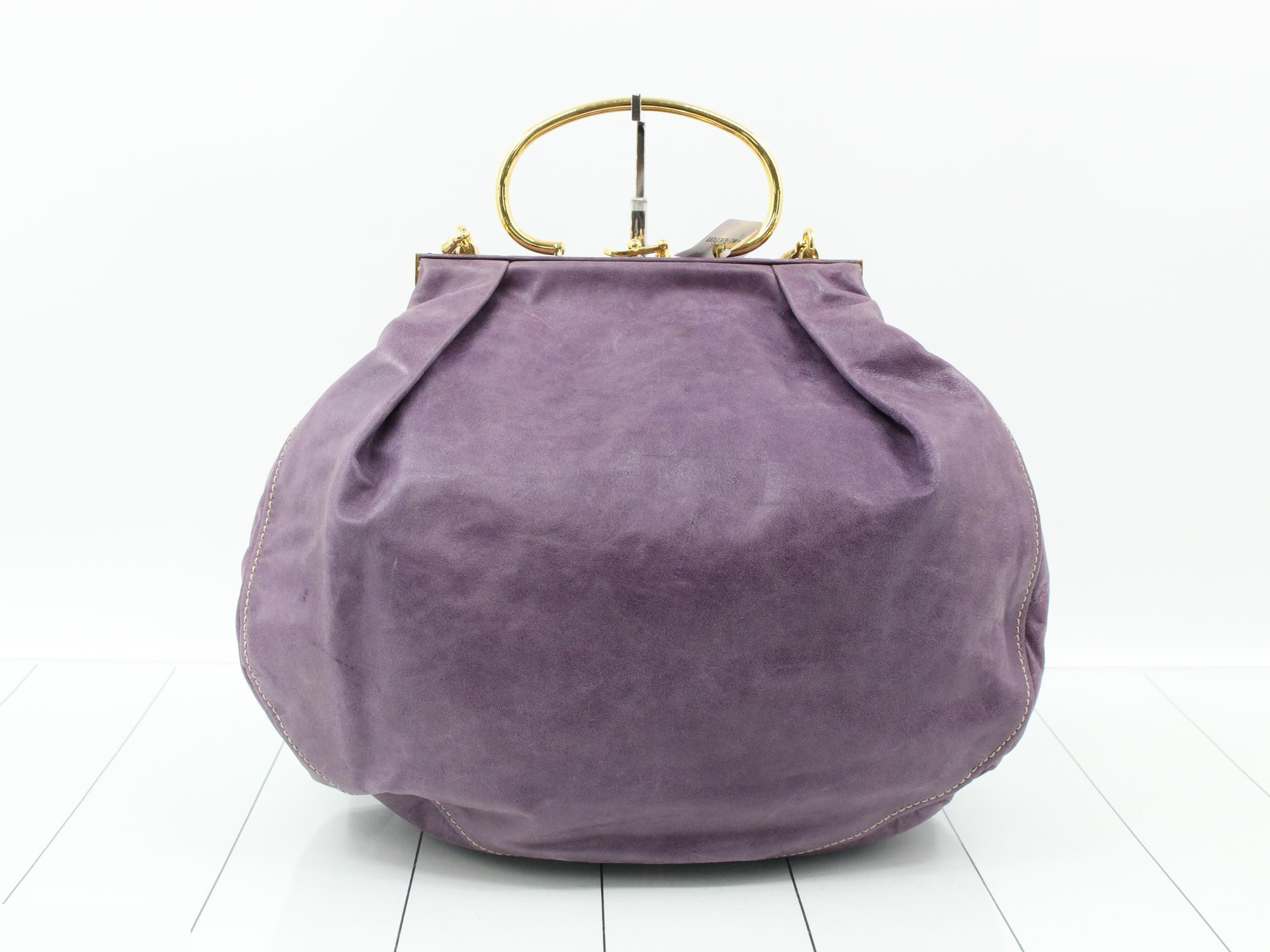 Other lines: 2-way bag with long strap, clasp closure, leather, purple. — view 2