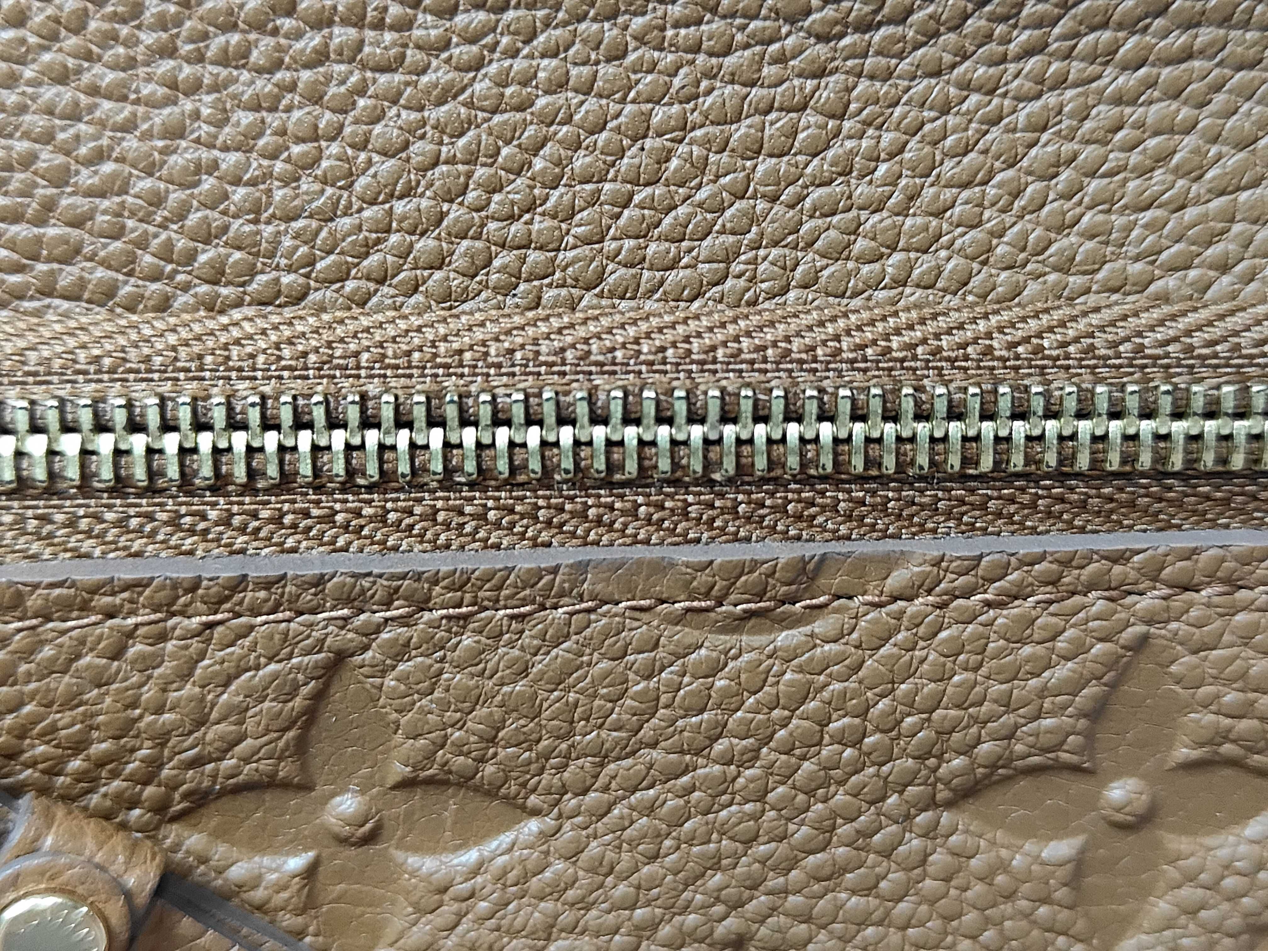 Monogram Empreinte Portefeuille Curieuse Compact M60568 Wallet — view 11