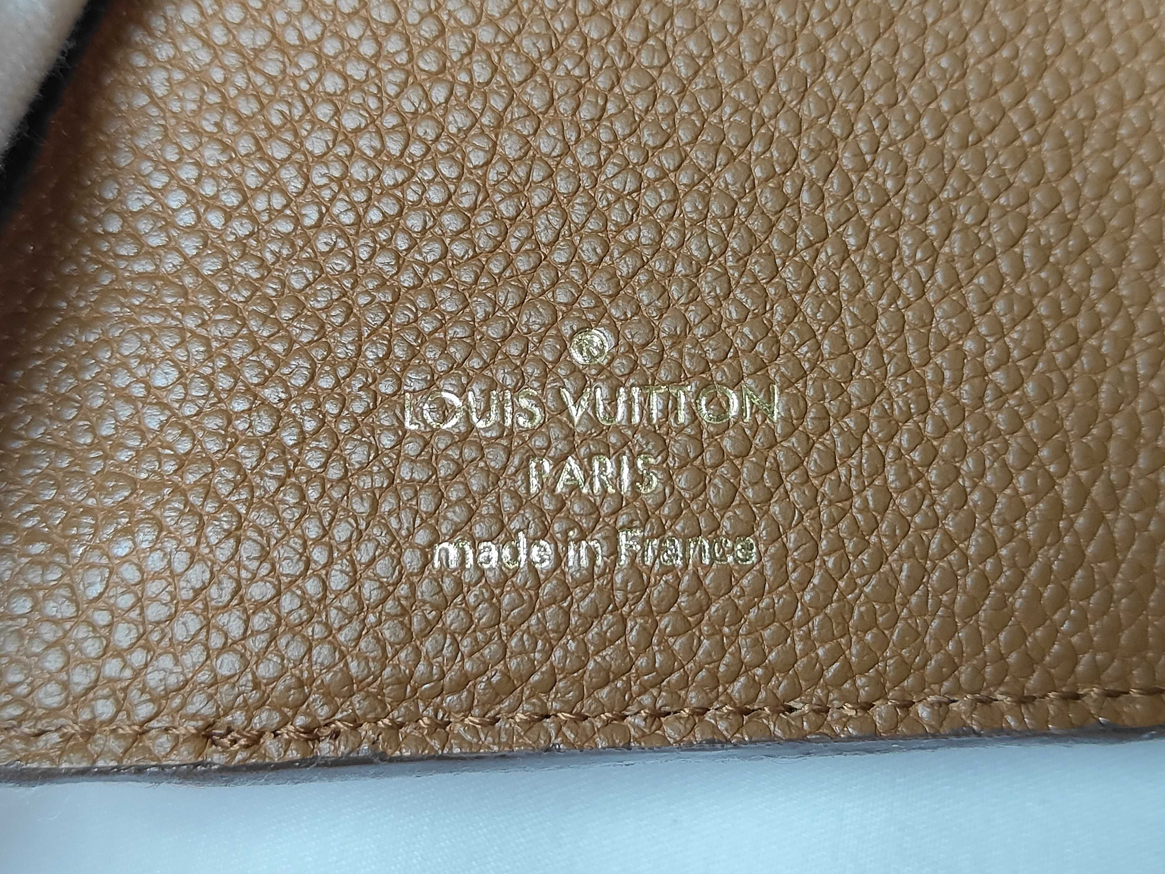 Monogram Empreinte Portefeuille Curieuse Compact M60568 Wallet — view 14