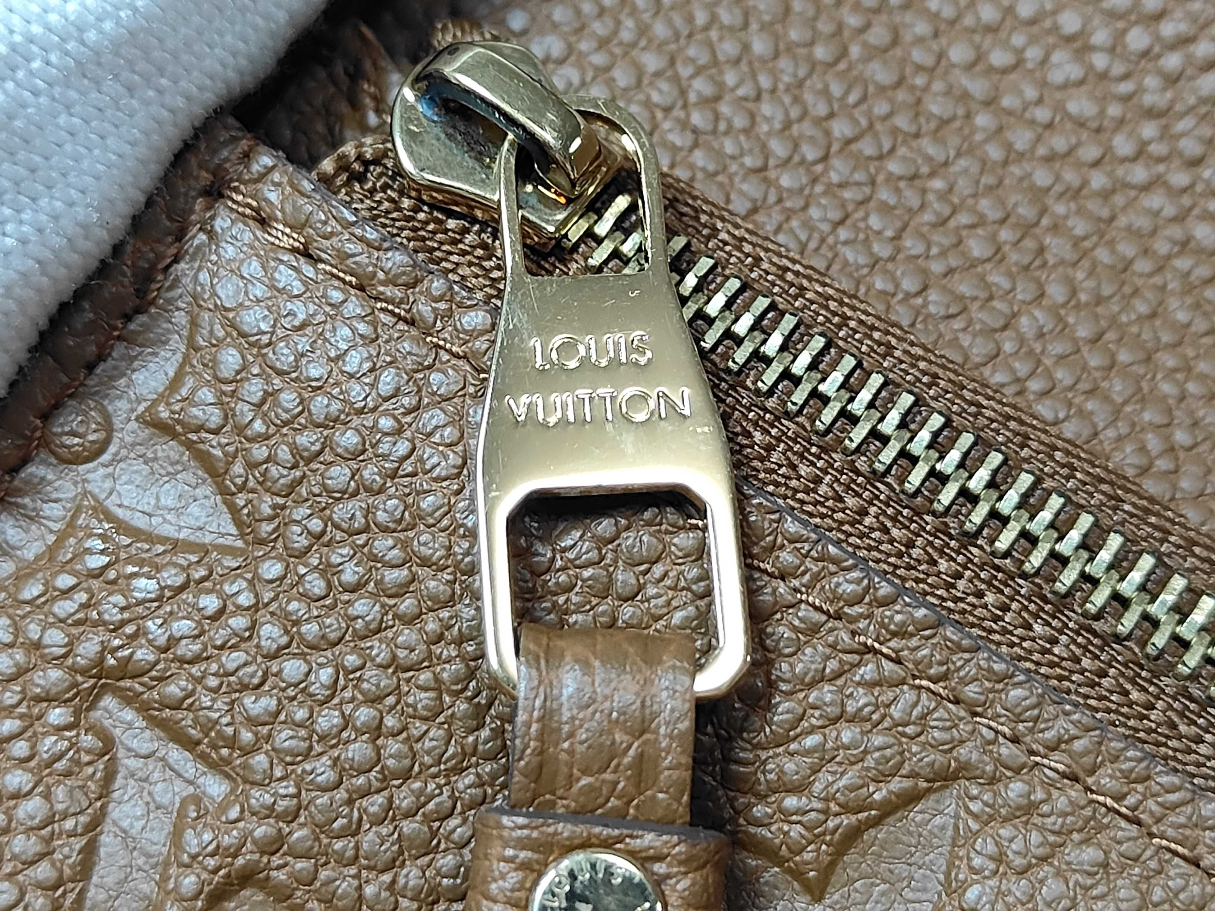 Monogram Empreinte Portefeuille Curieuse Compact M60568 Wallet — view 15