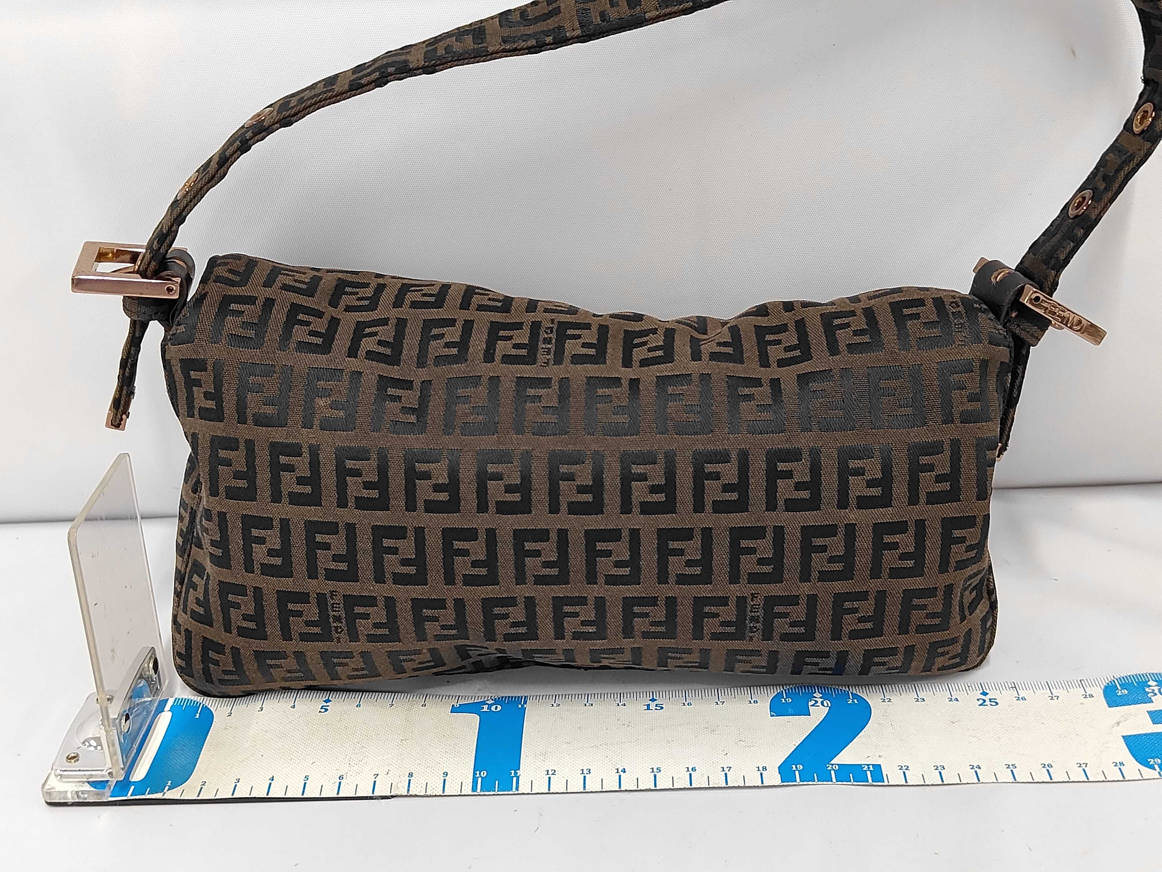 Baguette bag in dark brown/black zucchino canvas with gold hardware. — view 2