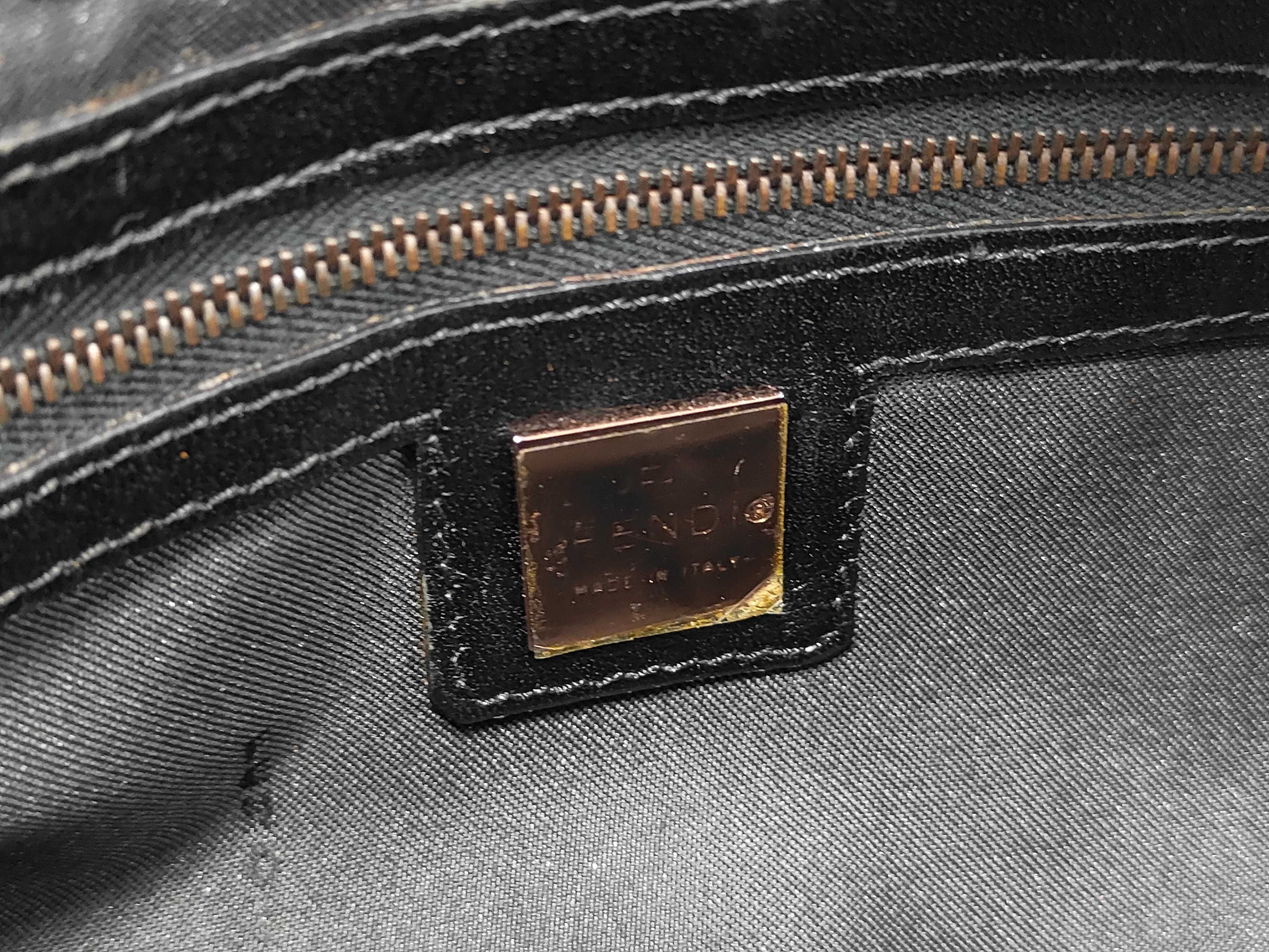 Baguette bag in dark brown/black zucchino canvas with gold hardware. — view 11