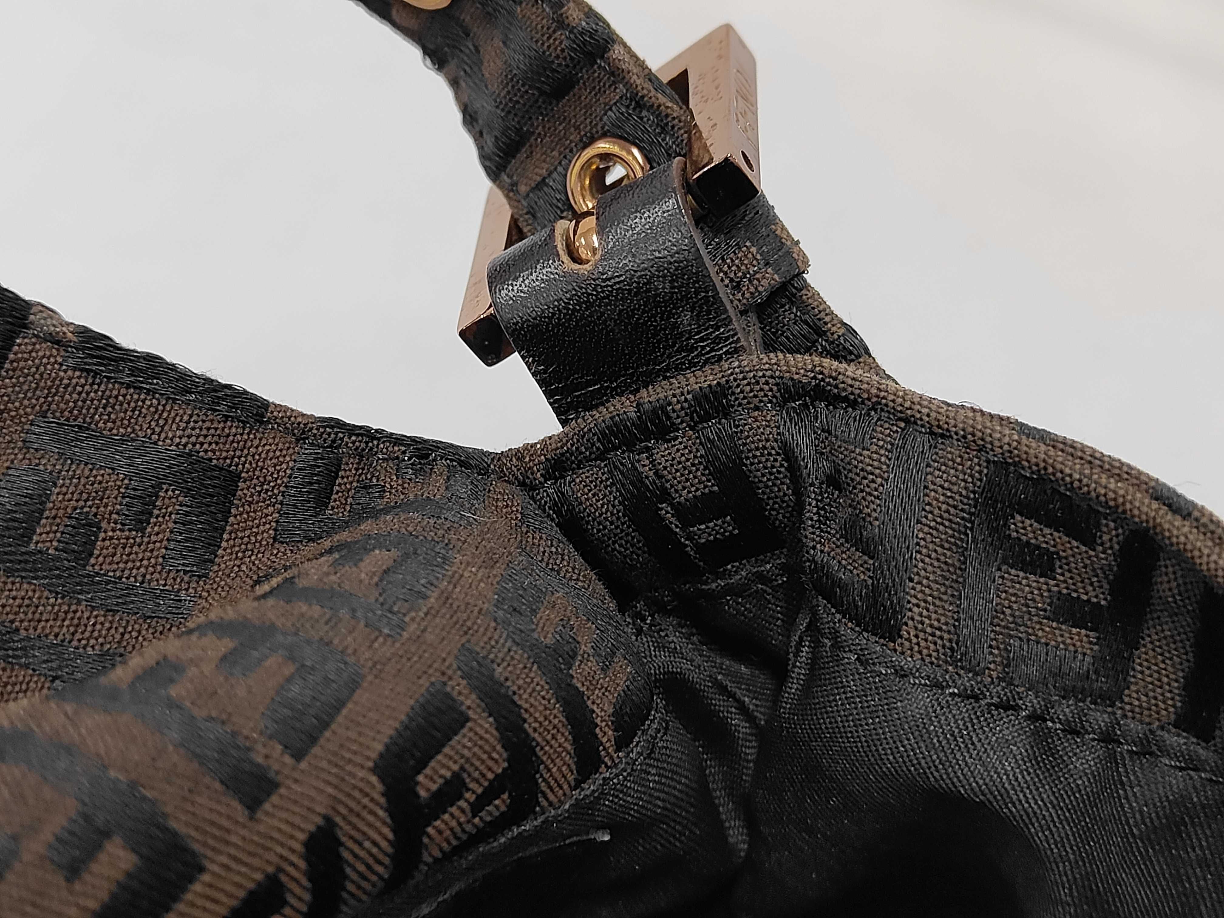 Baguette bag in dark brown/black zucchino canvas with gold hardware. — view 14