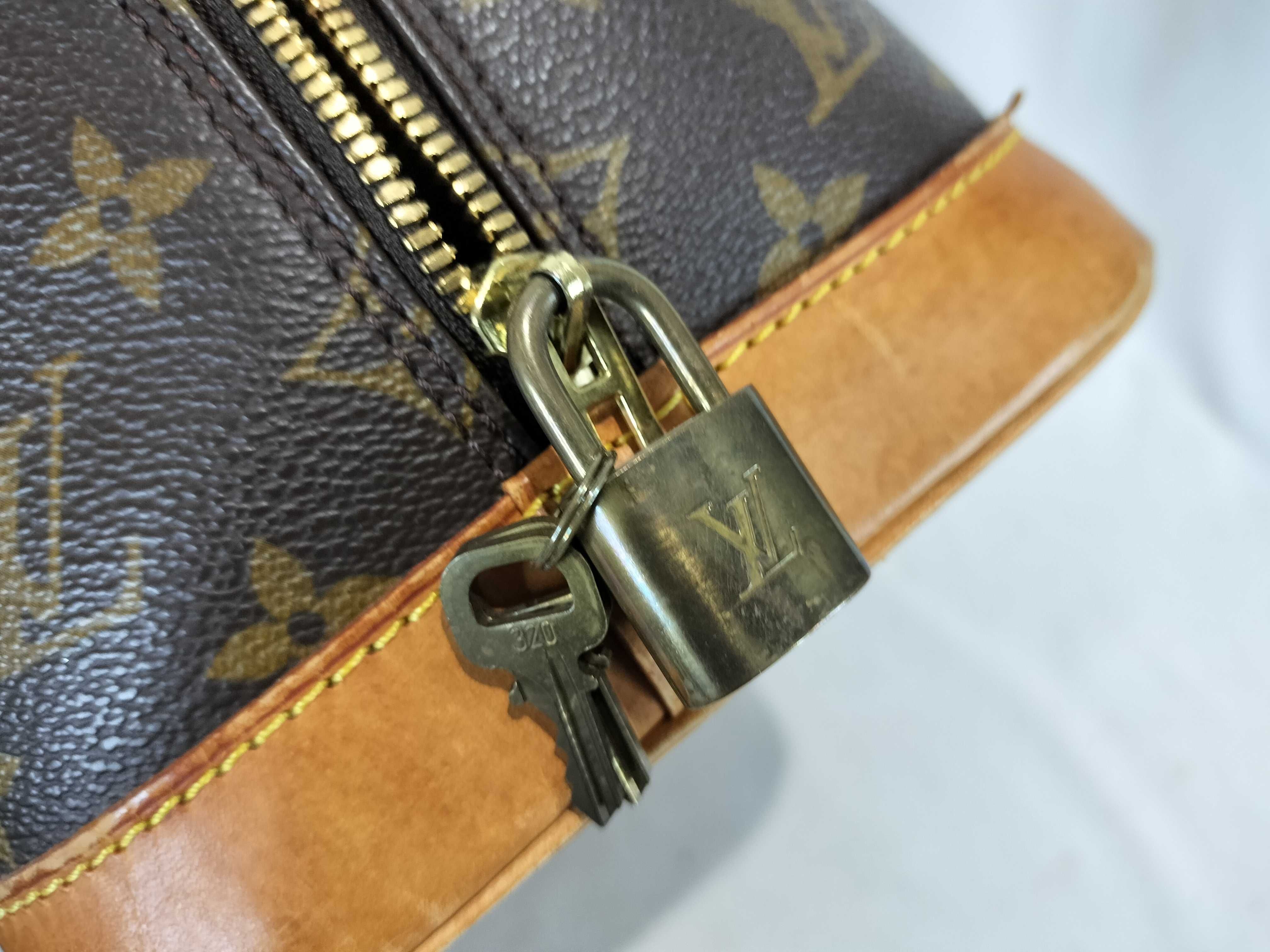 Monogram Alma Handbag with Padlock — view 12