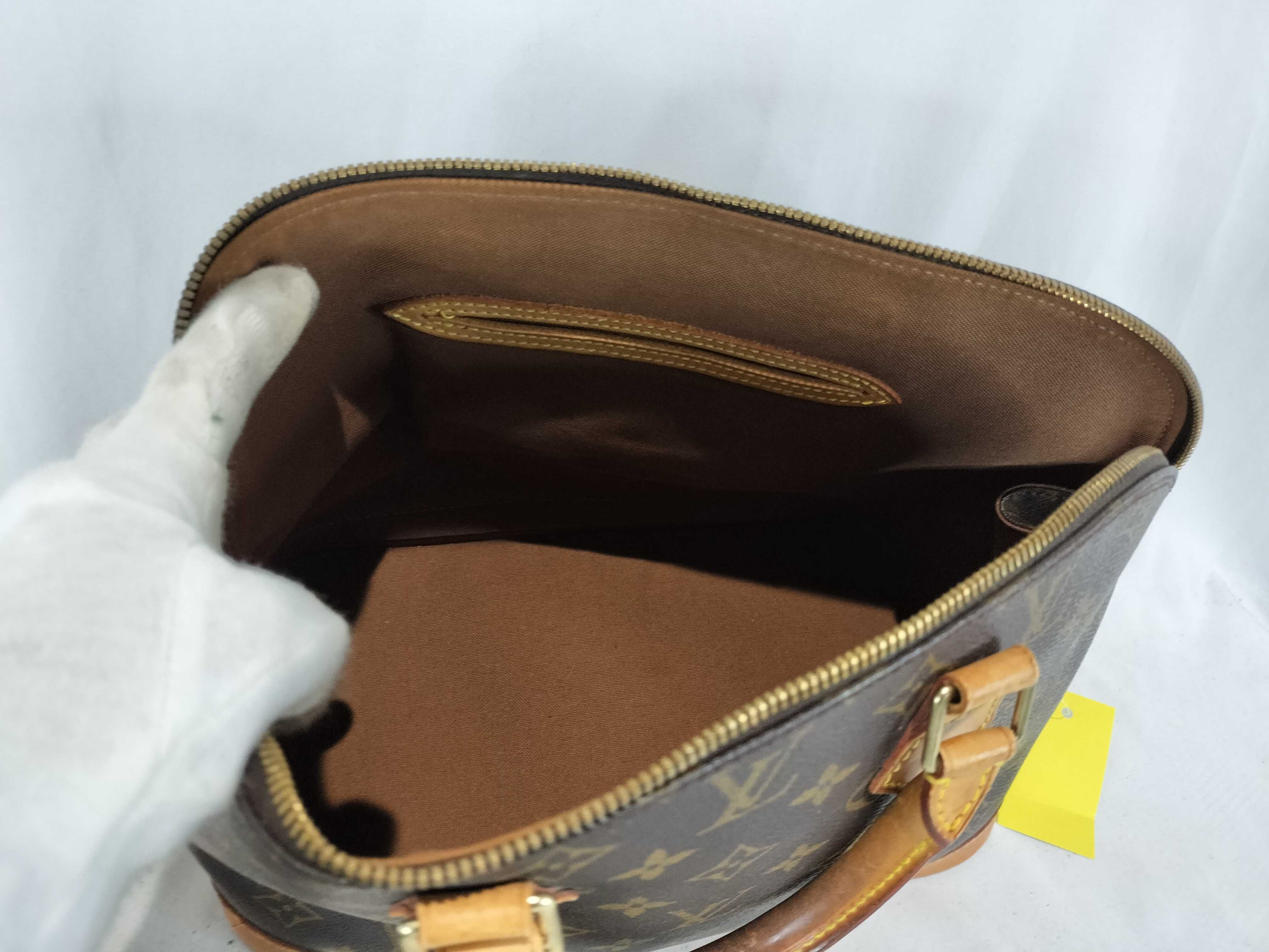 Monogram Alma Handbag with Padlock — view 9