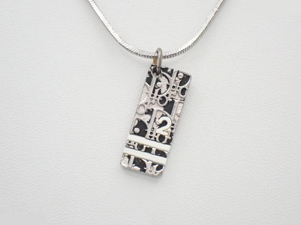 Trotter (precious metal) necklace pendant, chain approximately 42cm