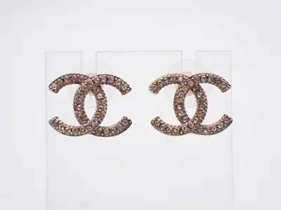 earrings, A19K gold, Coco Mark design, rhinestones, 2cm wide.