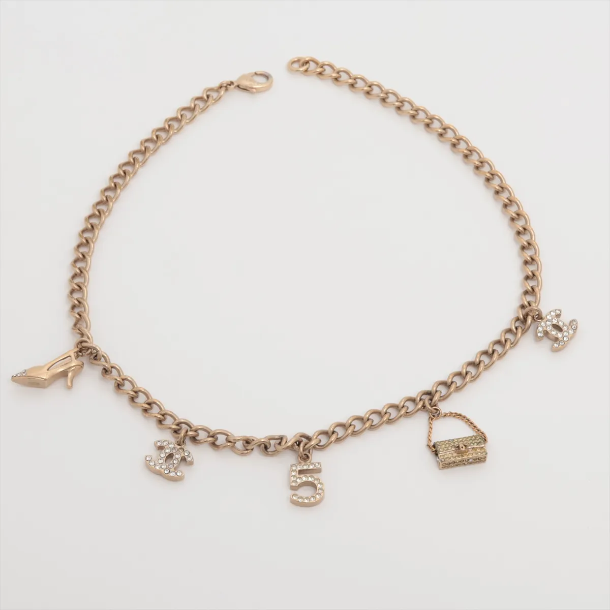 Coco Mark Icon 05A Choker GP x Rhinestone Gold. Shows