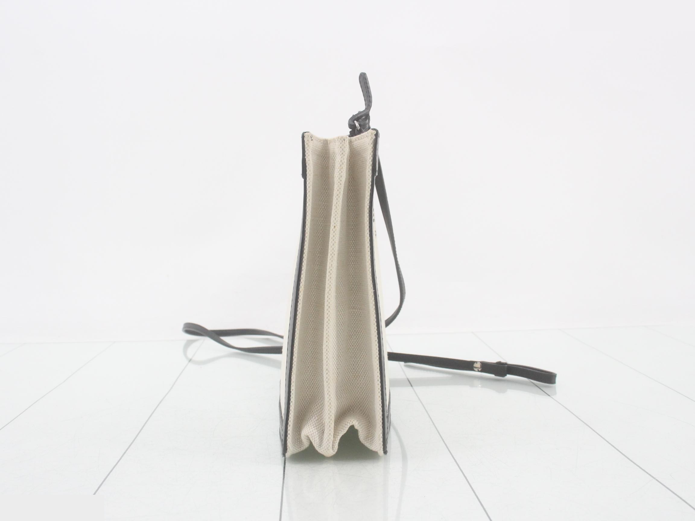 Navy pochette, ivory, black canvas — view 4