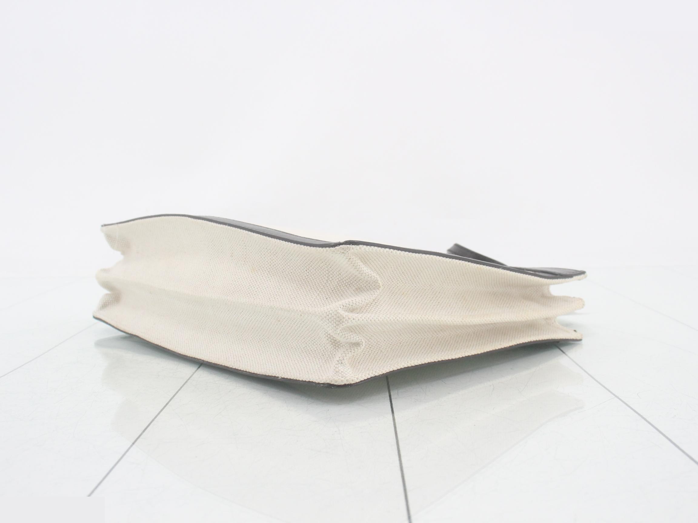 Navy pochette, ivory, black canvas — view 6