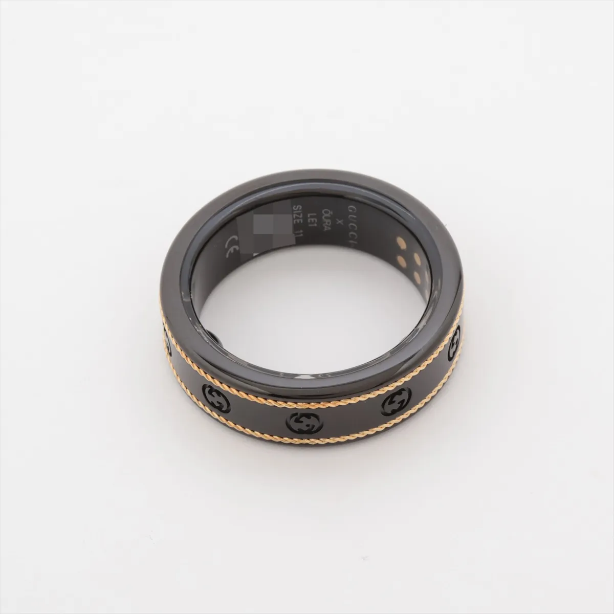 x Aura Interlocking G Ring, Size 11, Titanium, Black x Gold. Shows — view 2