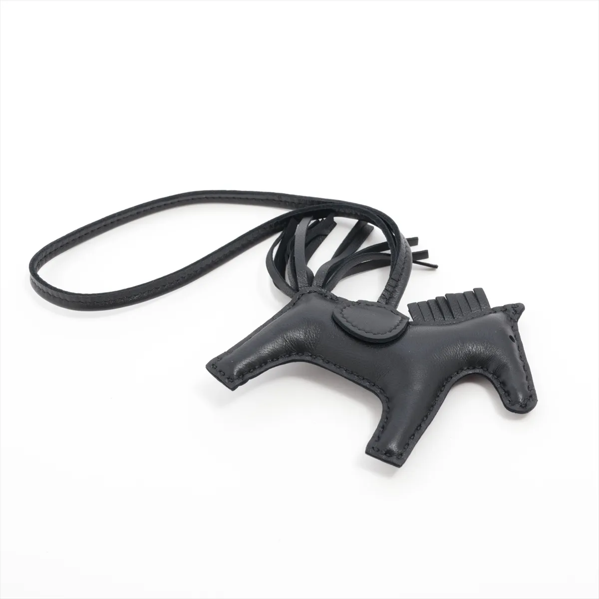 Rodeo Charm PM, G stamp: 2026. Charm in Agneau Milo Noir leather. Shows signs of wear, — view 2