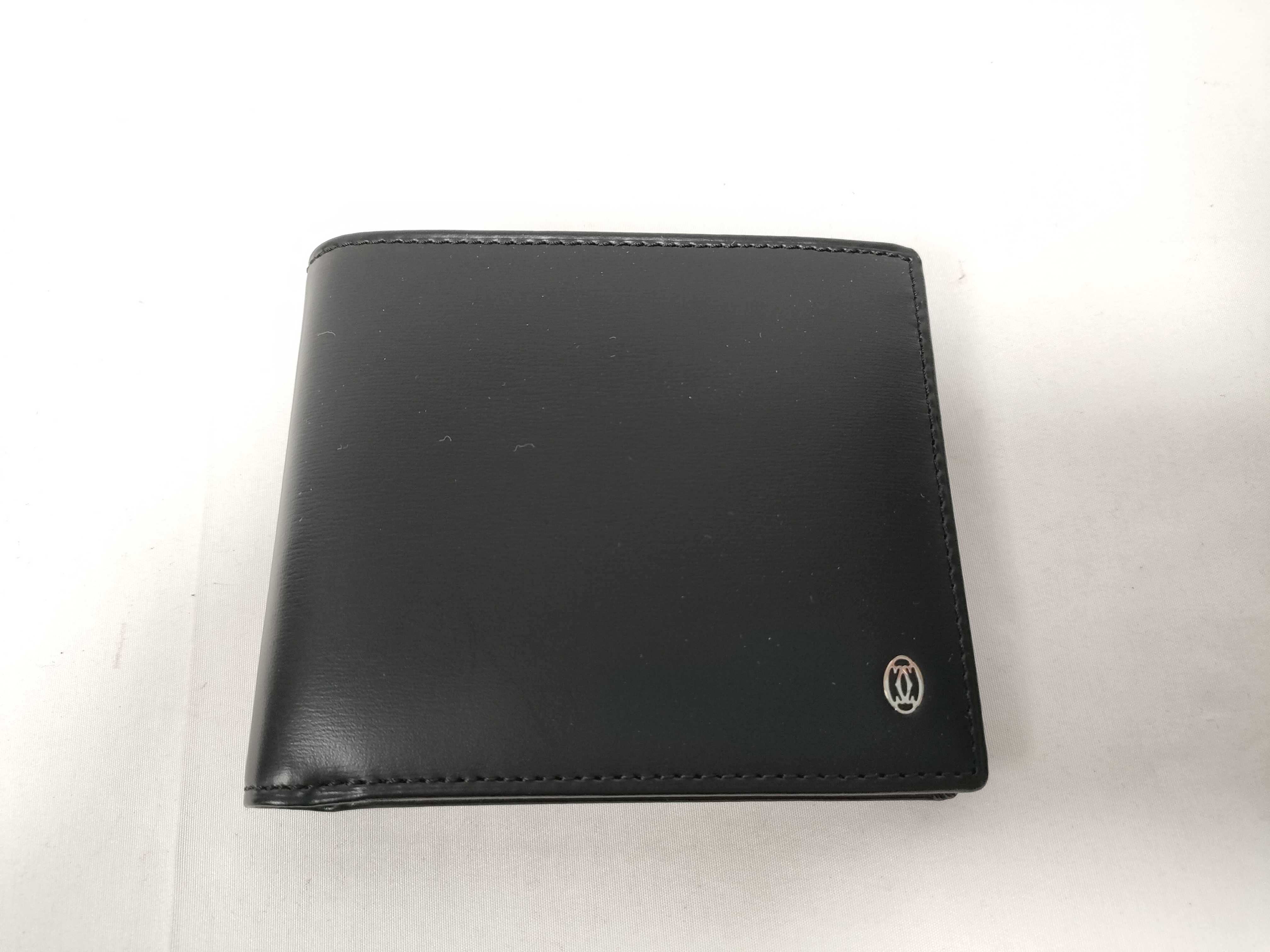 bi-fold wallet, black, with box and warranty.