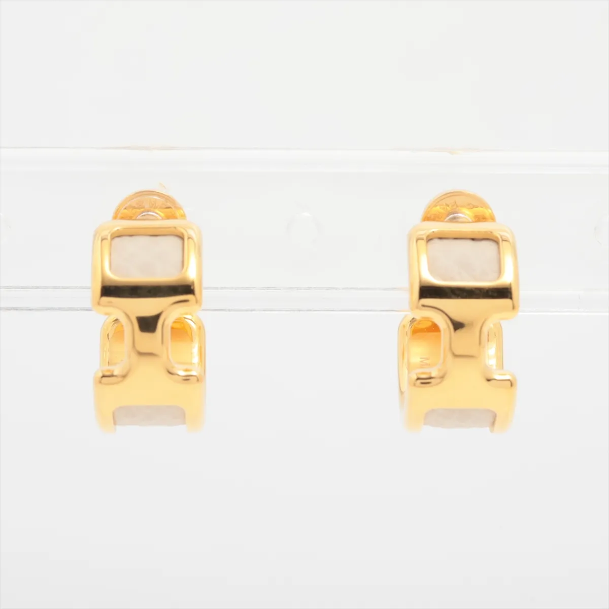 Olympe hoop earrings, gold-plated leather, gold and white. Shows signs of wear including — view 2