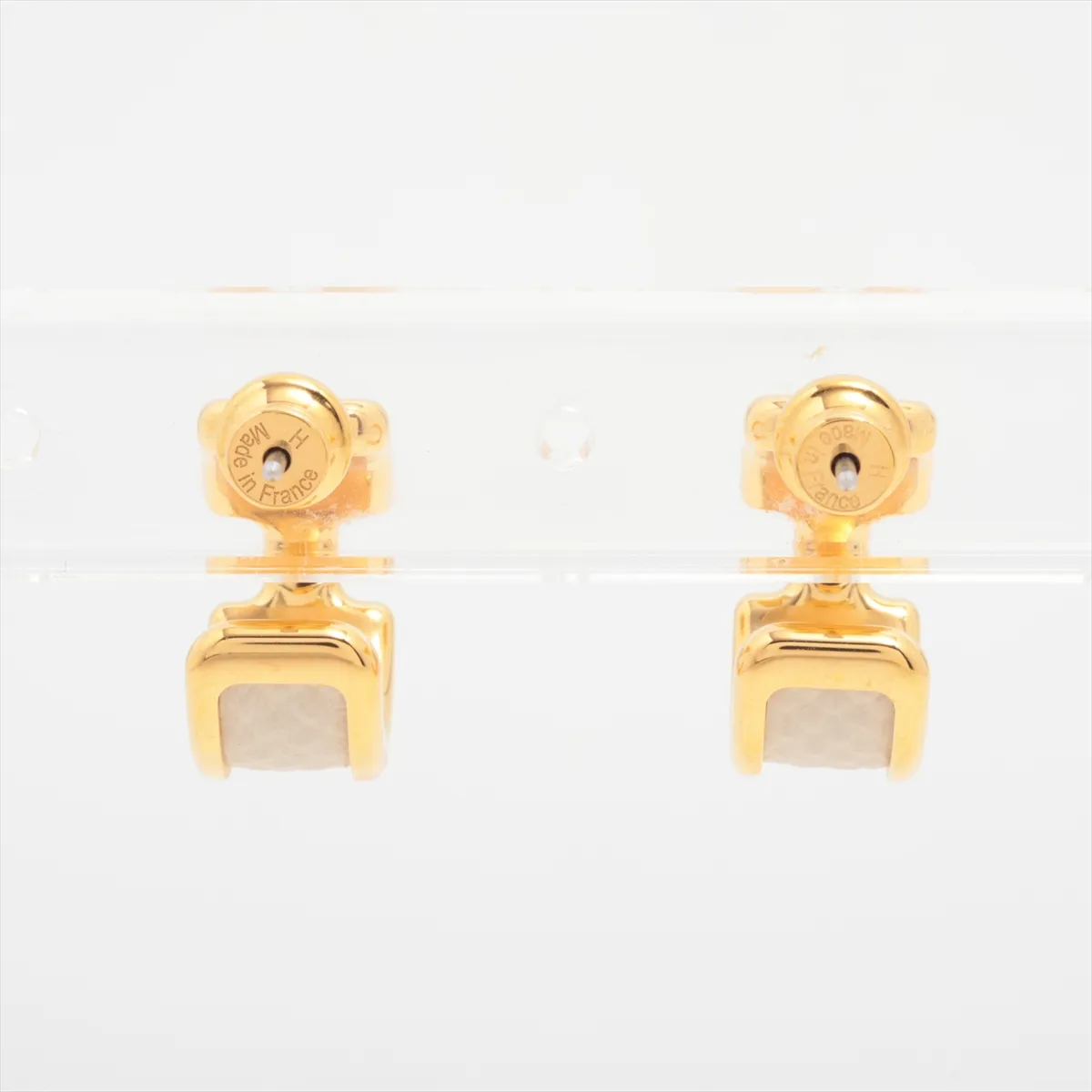 Olympe hoop earrings, gold-plated leather, gold and white. Shows signs of wear including — view 3