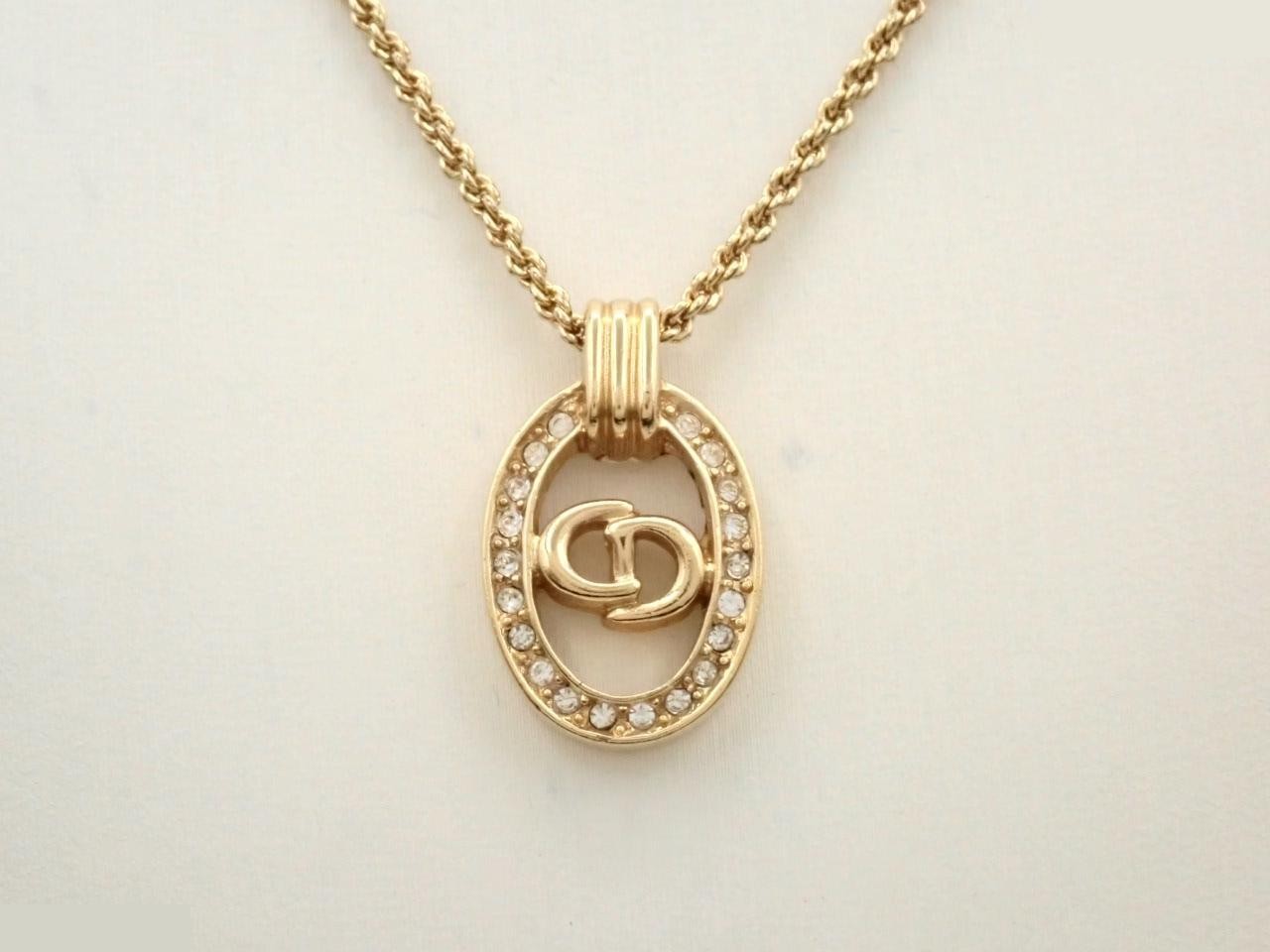 CD logo, rhinestone, precious metal necklace, pendant